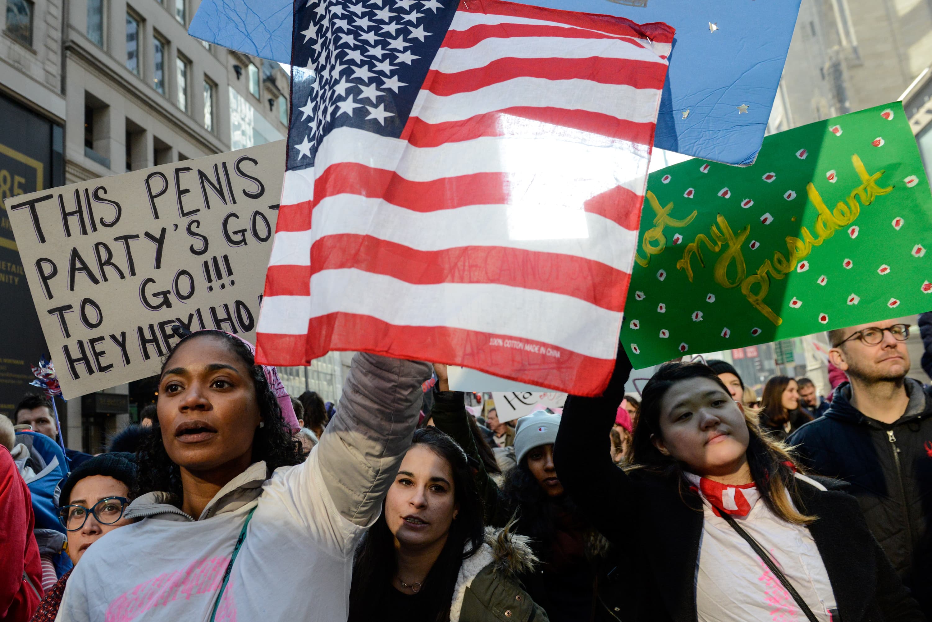 People participate in a Women's March to protest against President Donald Trump