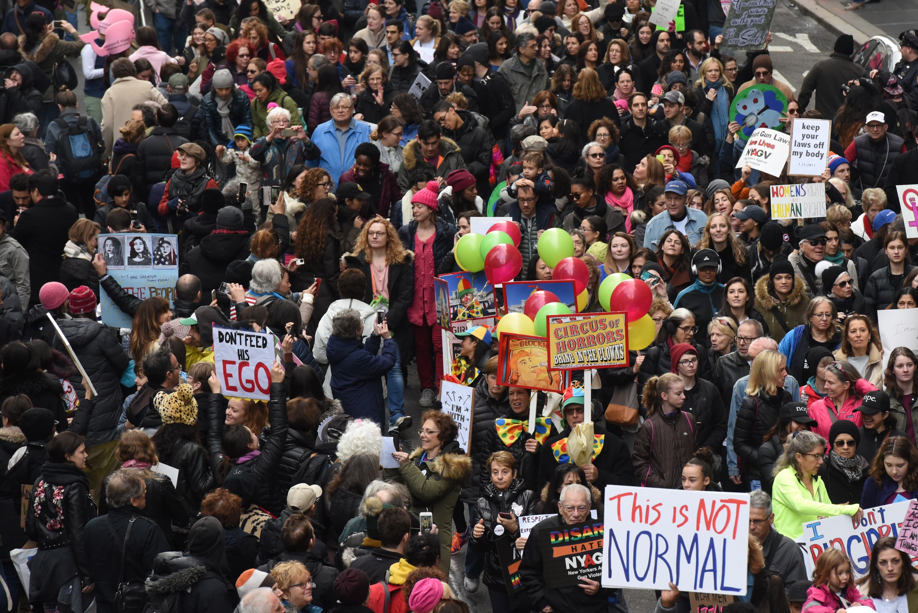 People participating in a Women's March