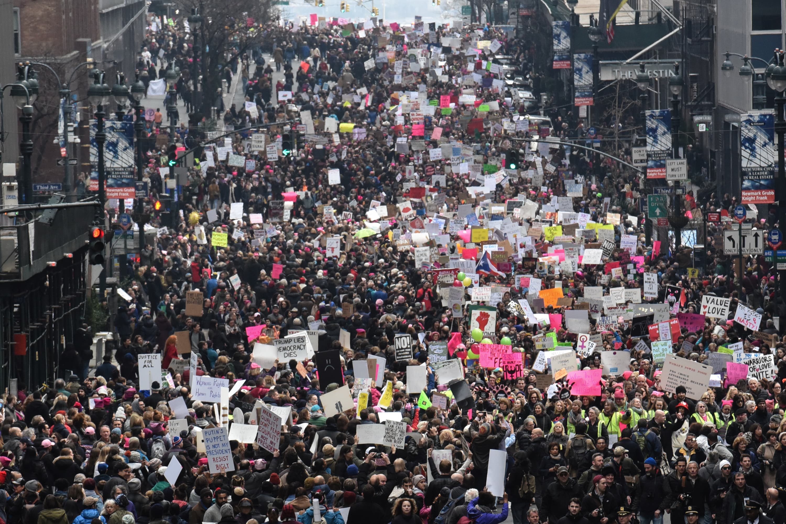 People participate in a Women's March to protest against US President Donald Trump in New York City, January 21, 2017.