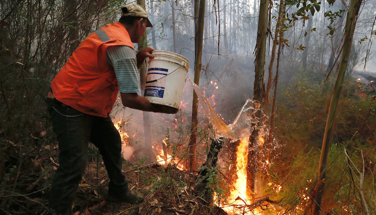 Locals put out fire chile
