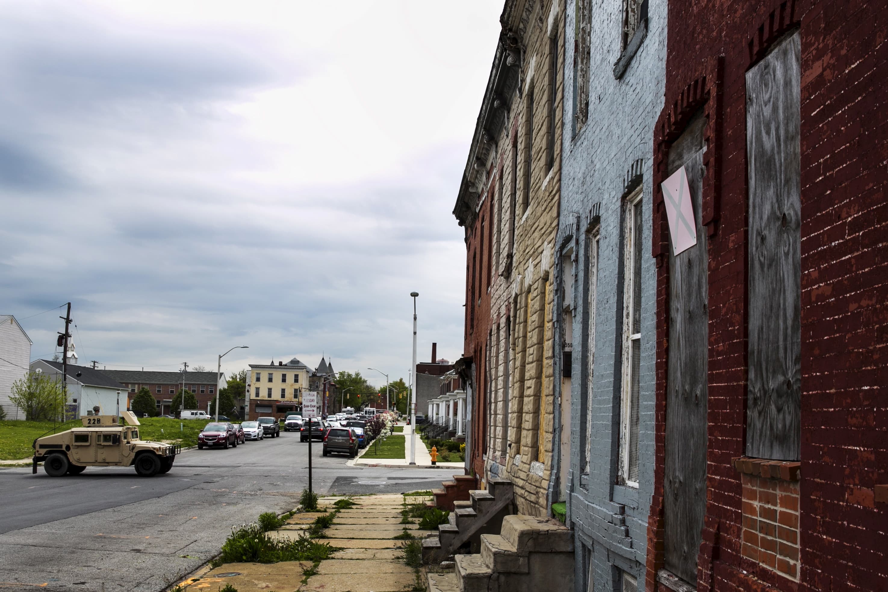 Military vehicles drive on the streets of Baltimore, Maryland May 1, 2015.