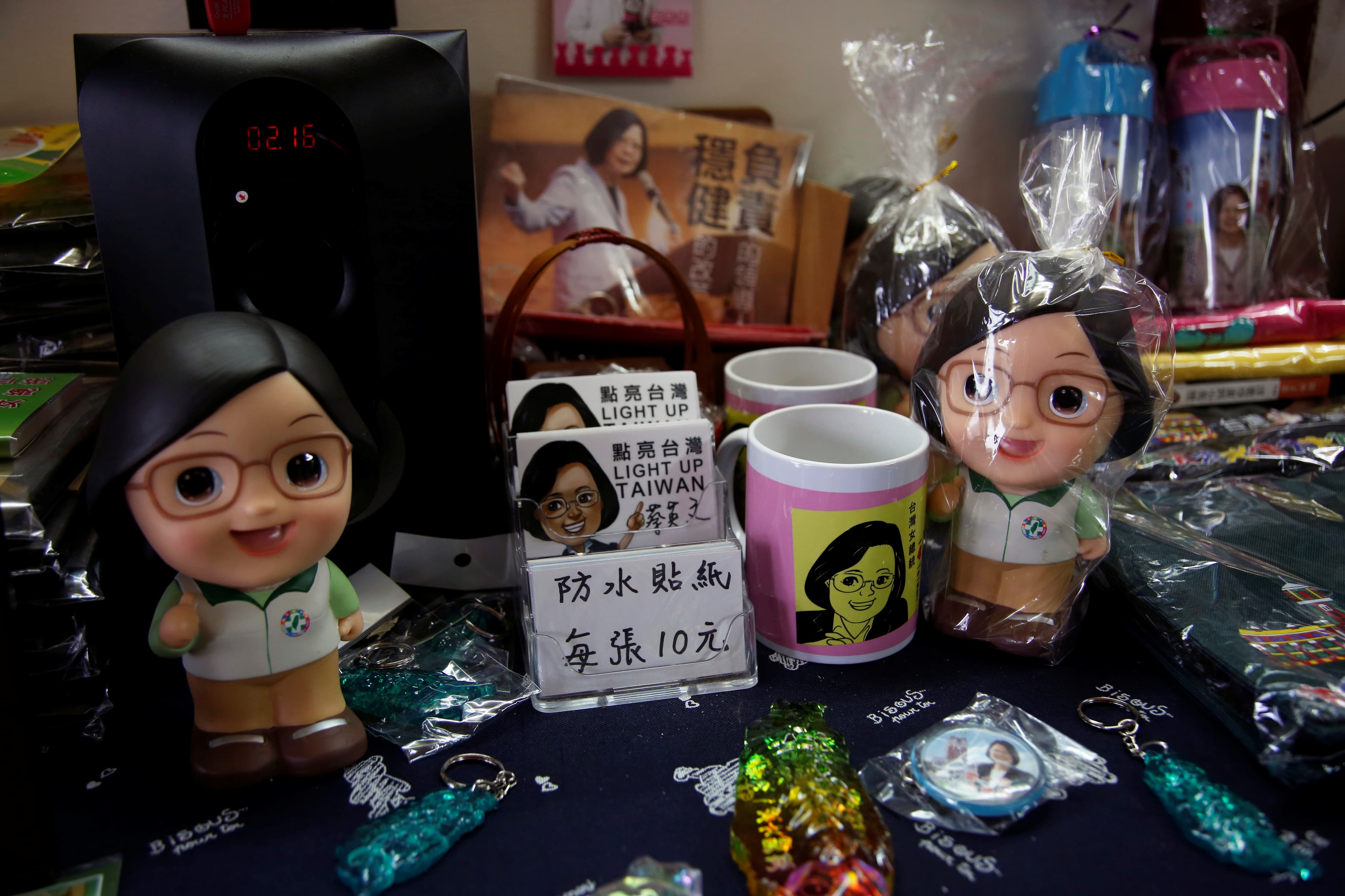 Rubber toys and knick-knacks featuring a cartoon woman with glasses