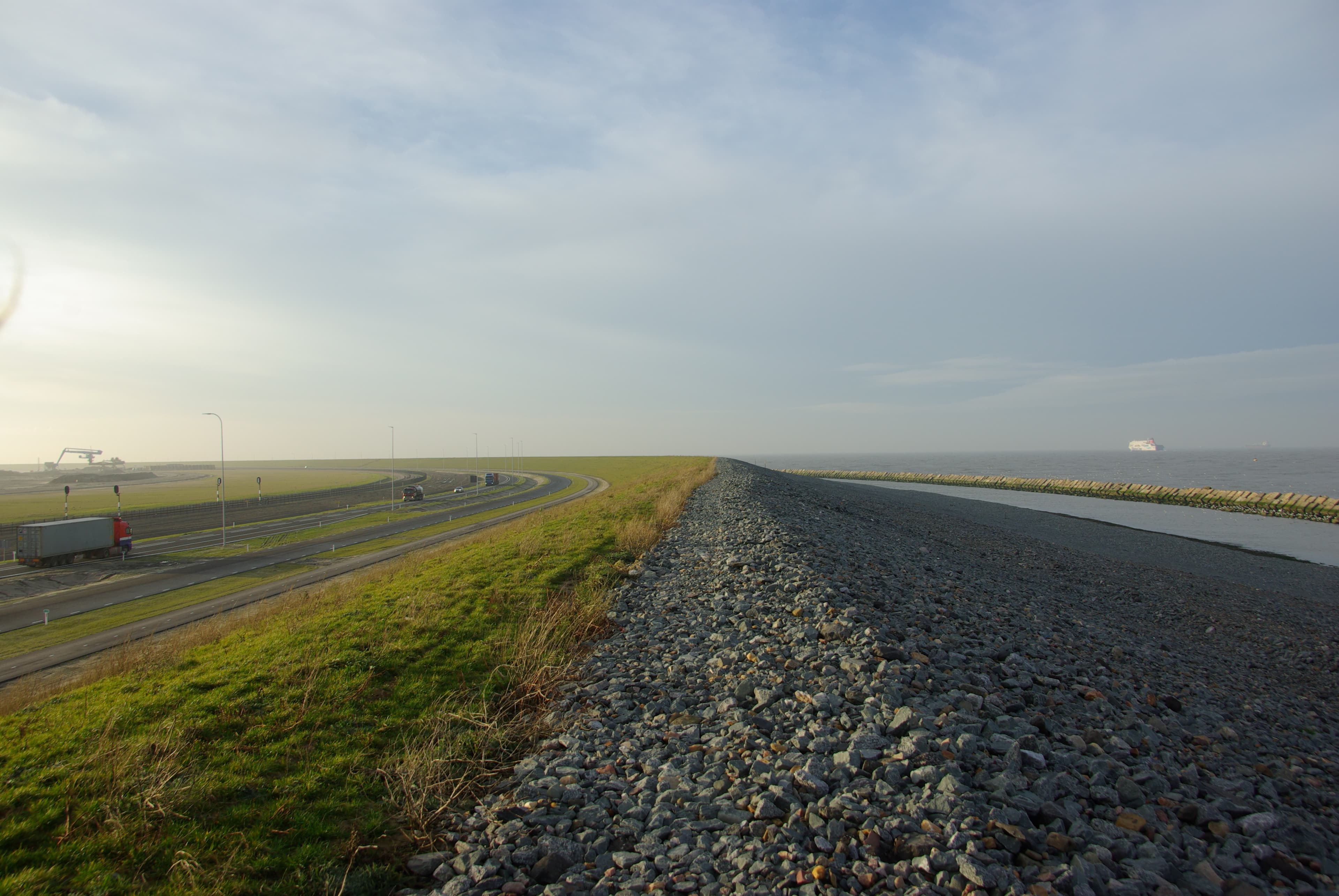 The €725 million storm protection barriers around the expanded port of Rotterdam includes 20,000 concrete cubes, a slope of stones and constructed dunes known as a “soft seawall.