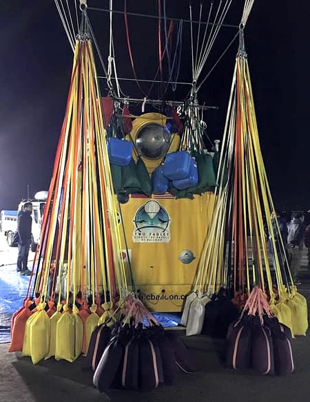 Two Eagles Balloon Team pilots Leonid Tuikhtyaev and Troy Bradley entering the capsule for launch from, Saga, Japan.