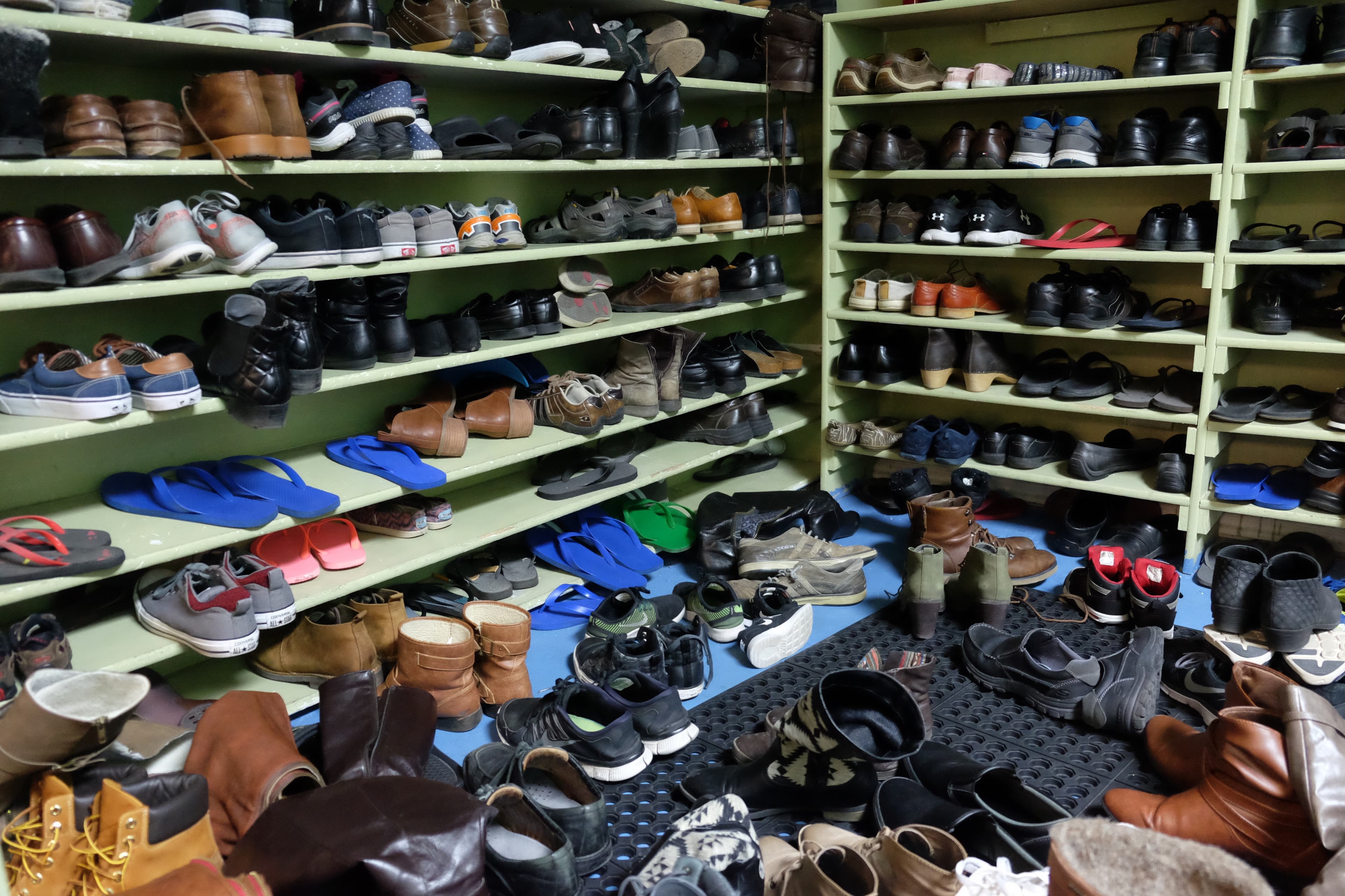 Shoes spill out onto the floor at the Utah Islamic Center's Friday night information sessions. Visitors and worshippers have to remove their shoes.