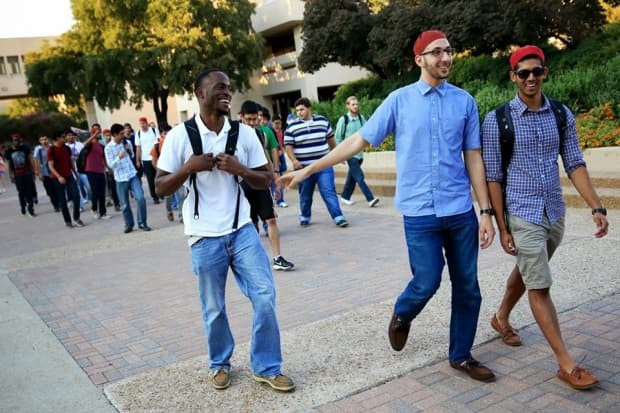 Fraternity brothers Omoruyi Eke, Ali Mahmoud and Yousuf Hassan (Left to Right) during Alpha Lambda Mu's first rush week at The University of Texas at Dallas. (PHOTO: Dylan Hollingsworth)