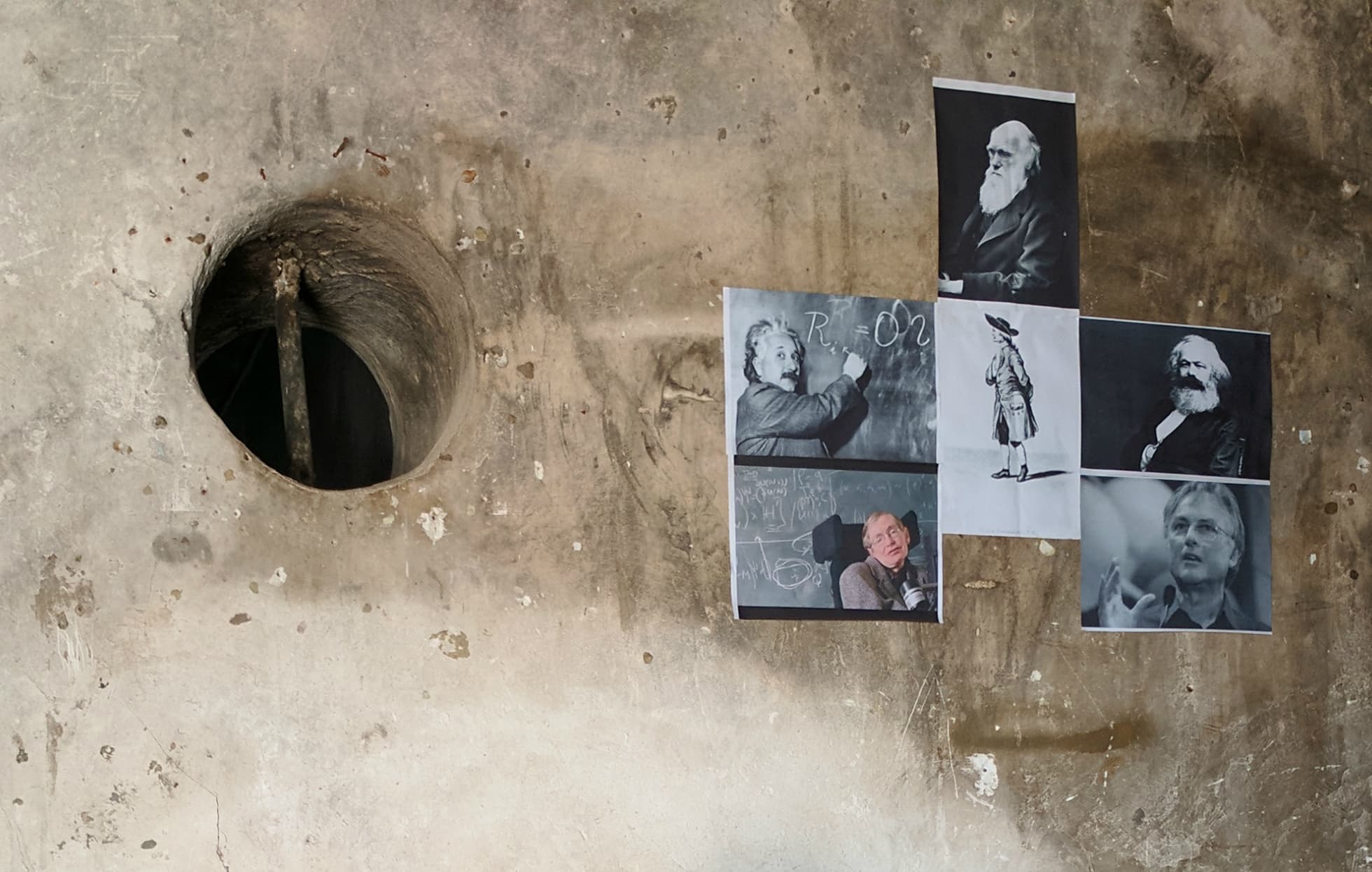 On the wall of his home, Ibrahim has put up portraits of Charles Darwin, Karl Marx, Albert Einstein and others.