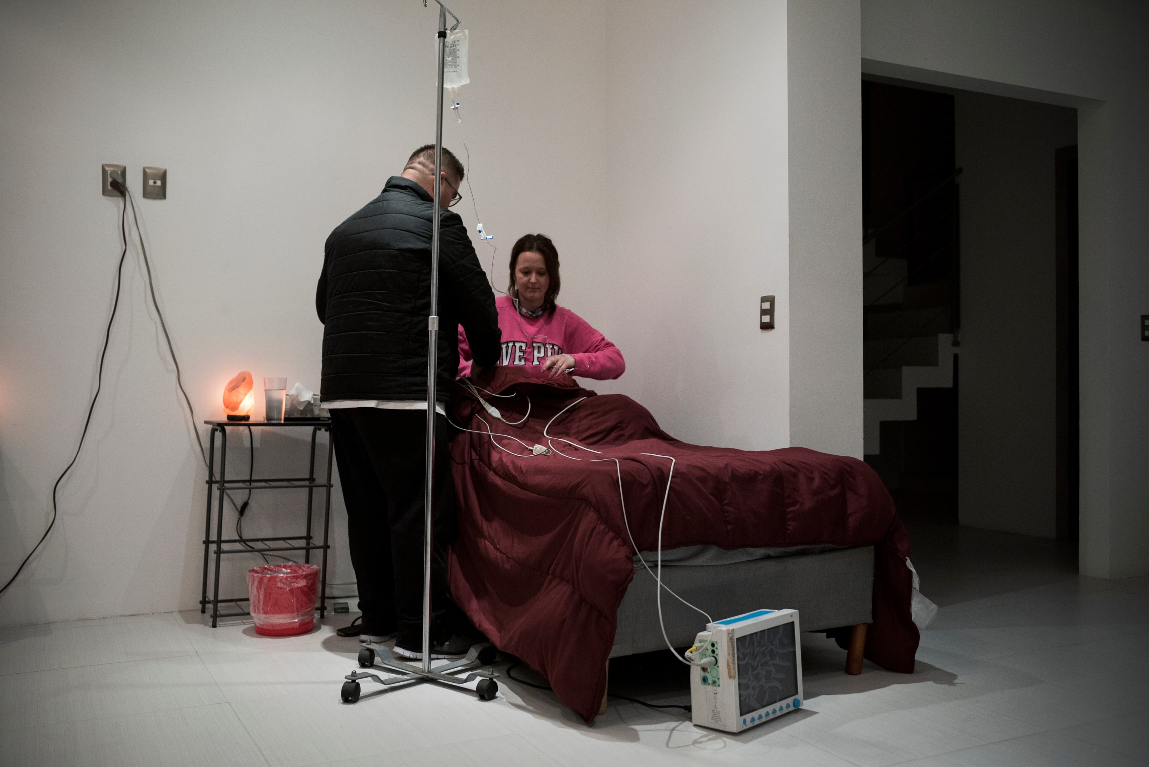 Emily Albert is hooked up to an EKG before she begins her 36-hour ibogaine treatment