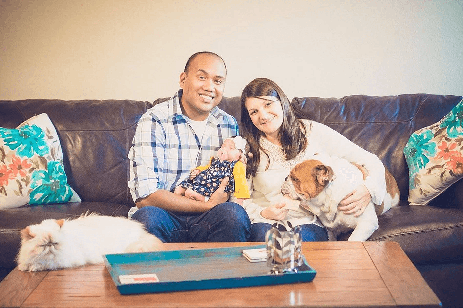 Teacher Shawn Sheehan poses with his wife and daughter.