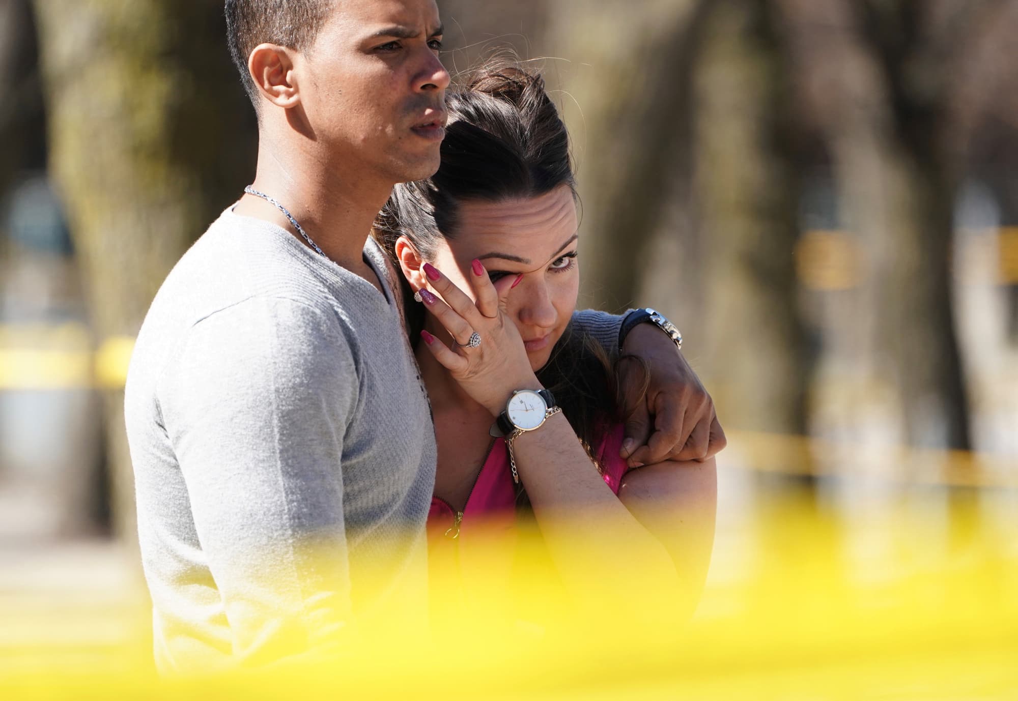 People react to an incident where a van struck multiple people at a major intersection in Toronto's northern suburbs.