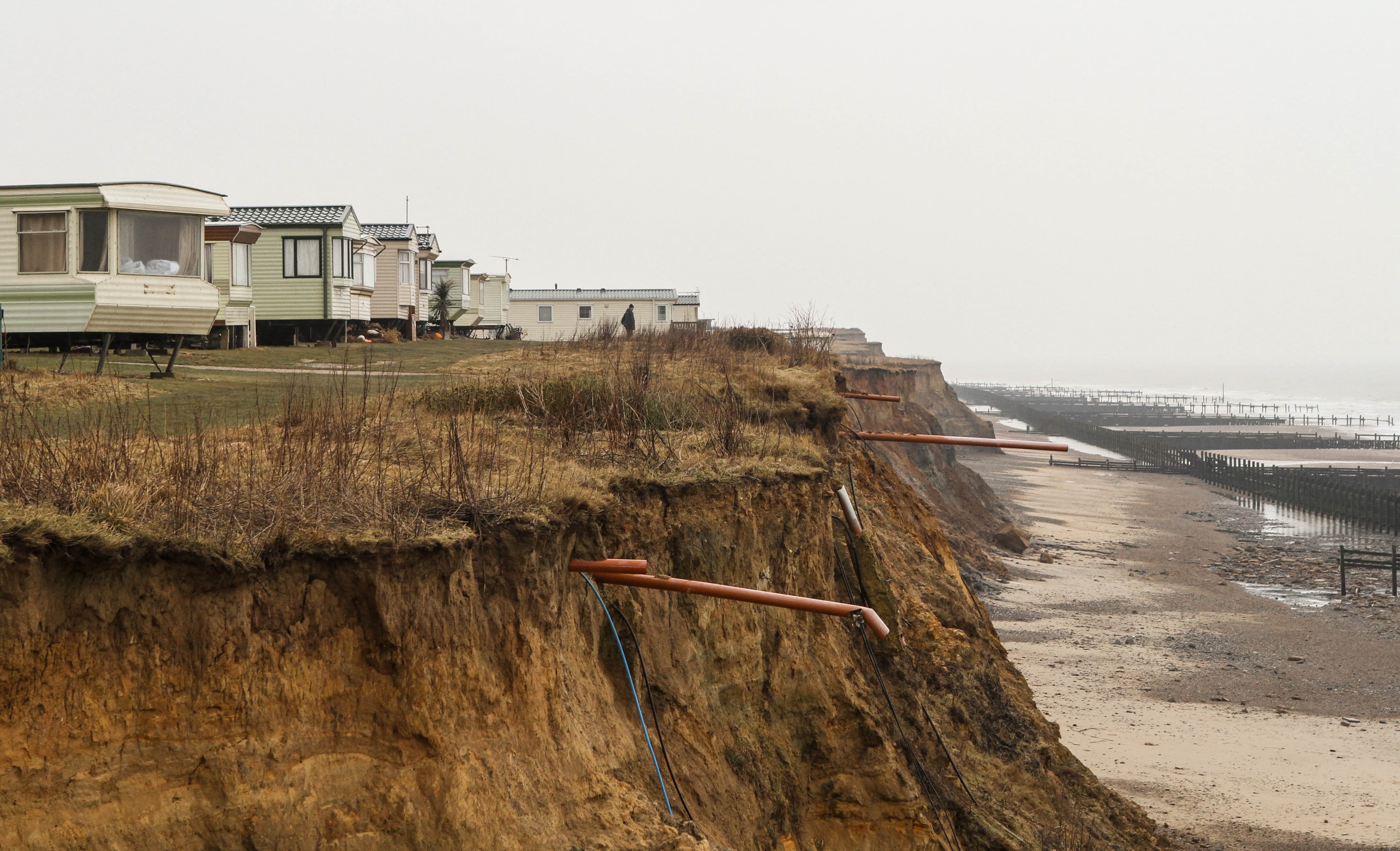 Exposed water pipes at a clifftop caravan park