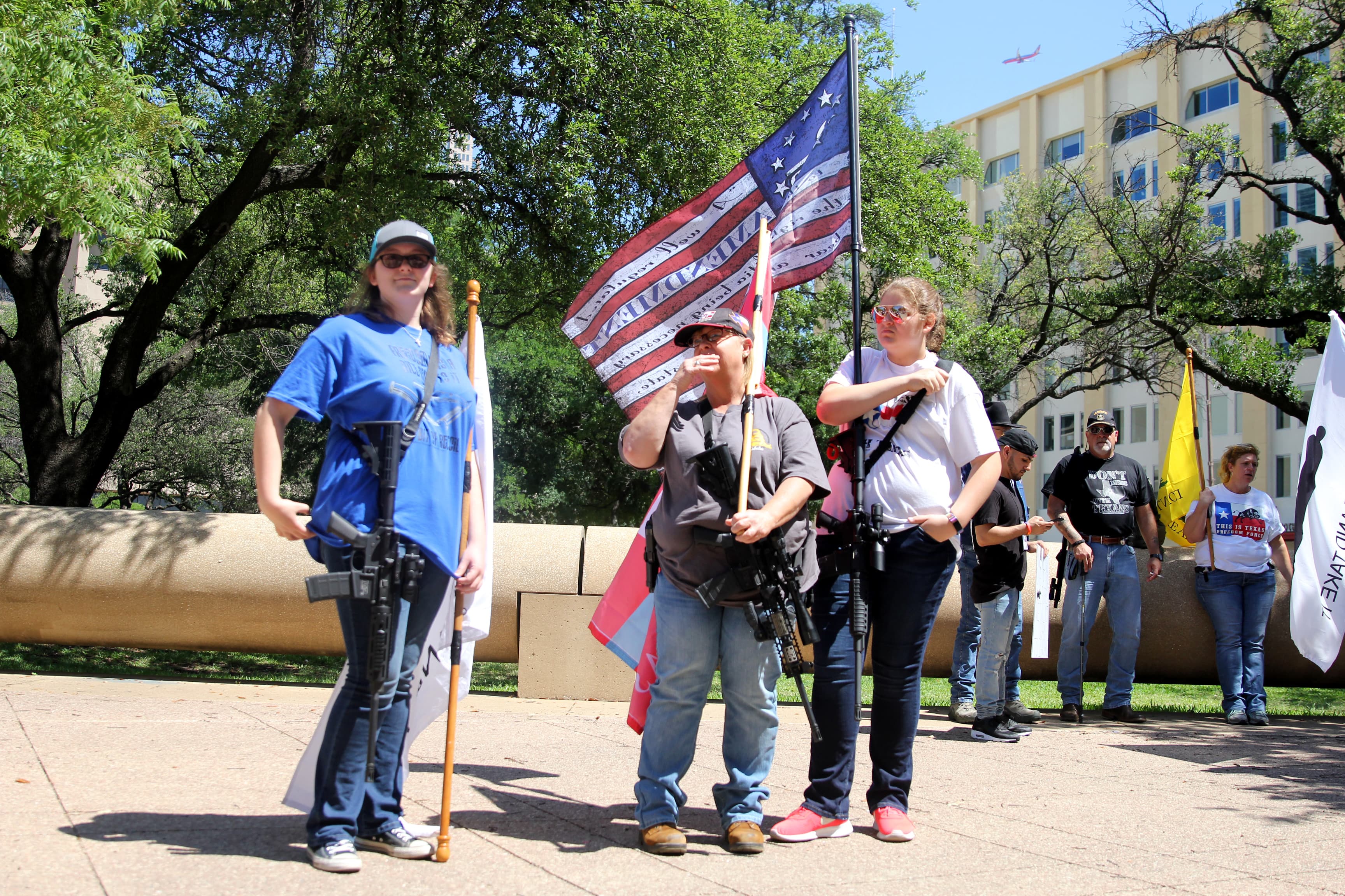 Emily (far left) and Nicole Defosse (far right, holding the 