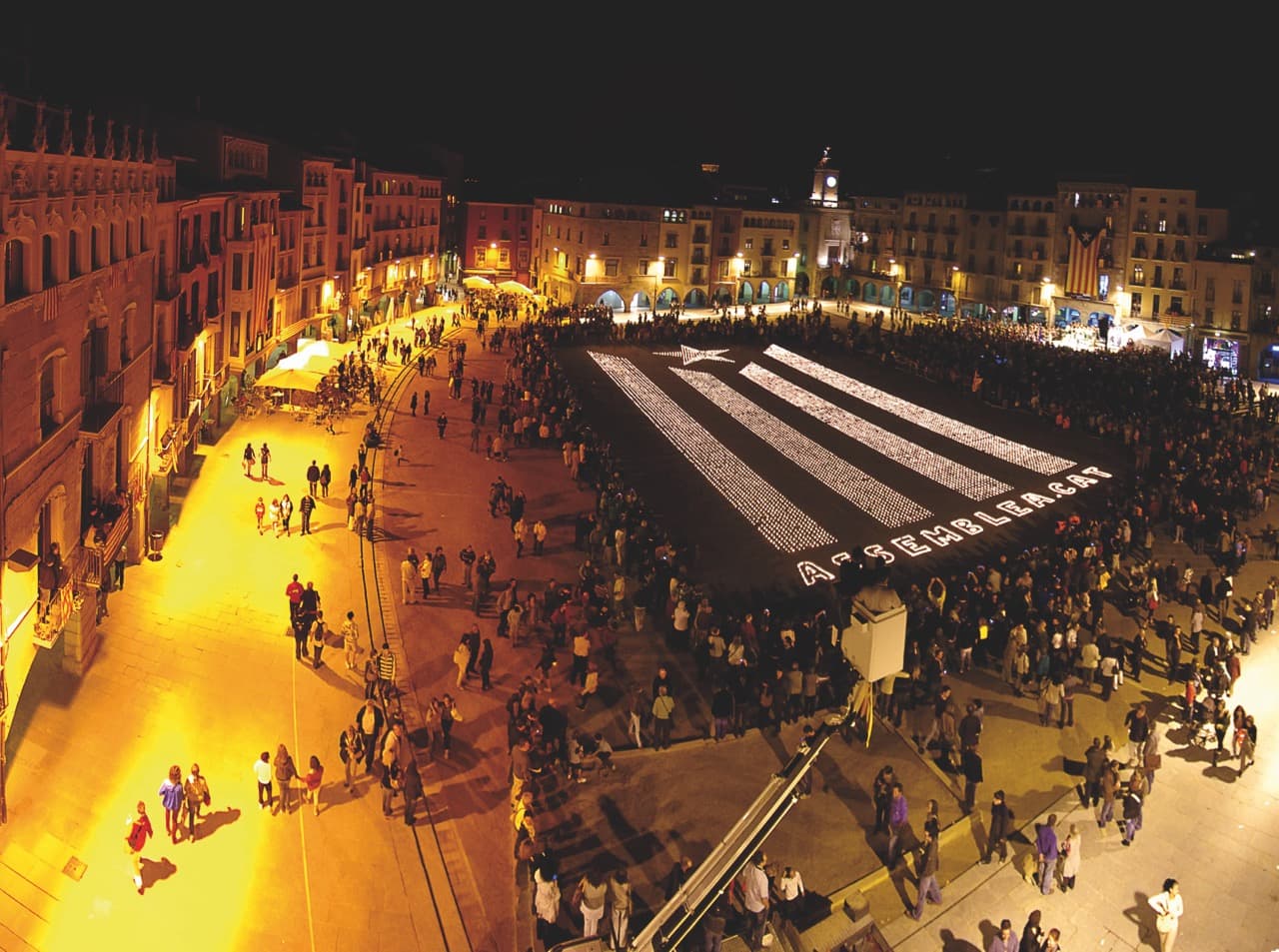 A candle flag lit by independence activists burns in Vic, a town in central Catalonia, on Oct. 12, 2012.