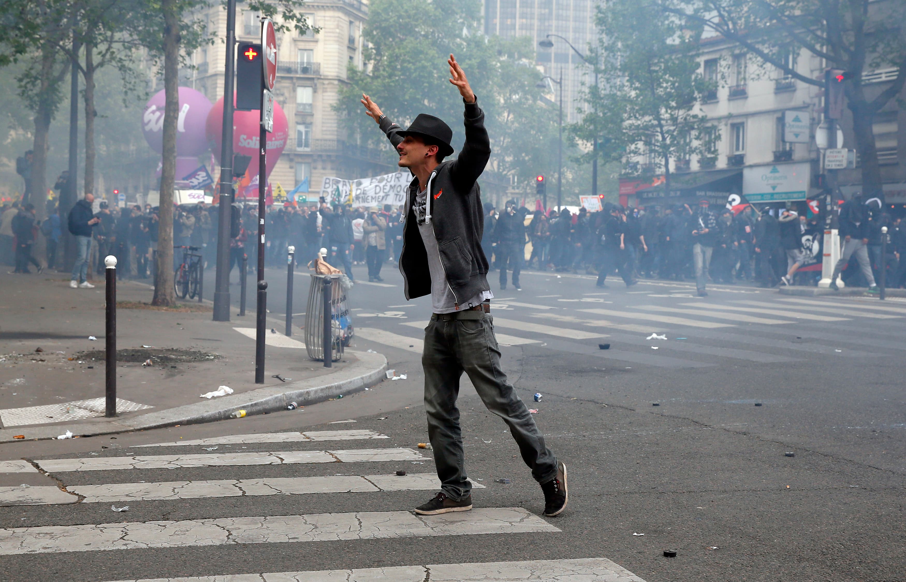 A protestor gesticulates during a demonstration against French labour law in Paris. May 12, 2016.