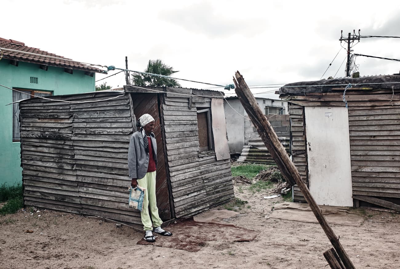 Lutango Nompumelelo in her backyard. 2013, Gugulethu, Cape Town