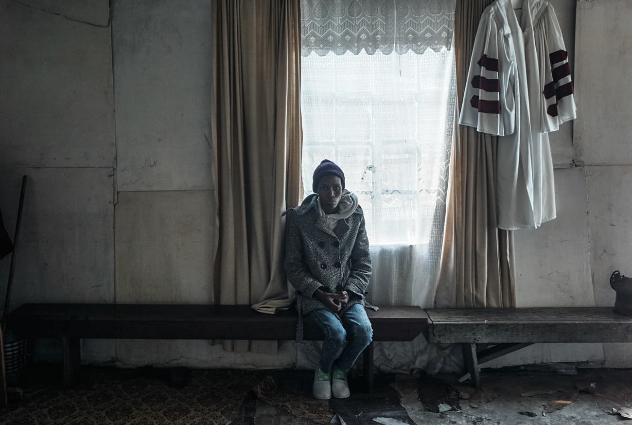 Fundiswa, 34, at a church where she sang. This photograph was taken in 2013. Fundiswa died in September 2013.