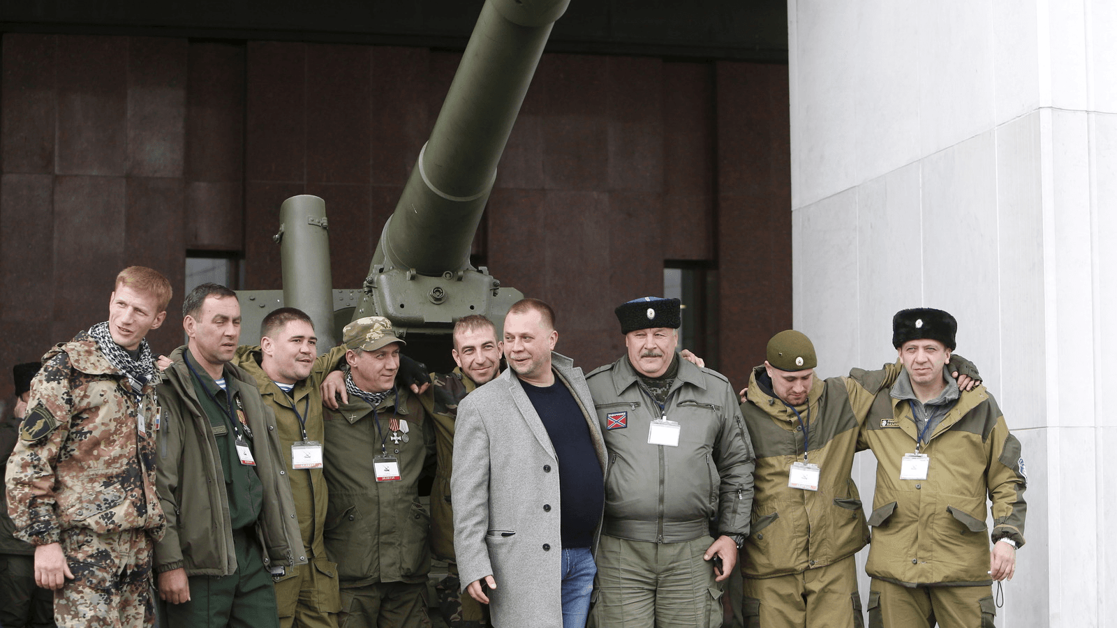 Alexander Borodai (C), former prime minister of the self-proclaimed Donetsk People's Republic, poses with delegates during the Union of Donbass Volunteers congress in Moscow, Russia, Oct. 10, 2015.