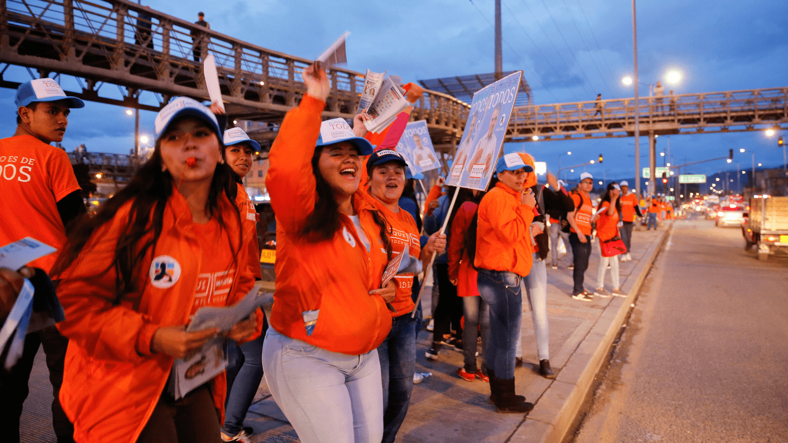 Supporters cheer with the leaflets and placards ahead of the second round of presidential election in Soacha, Colombia, June 11, 2018.