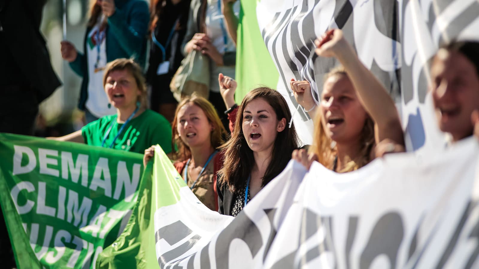 Members of environmental groups hold up banners calling for renewable energy at the United Nations climate talks that took place in Bonn, Germany in 2015. Bonn was the site of the last United Nations Climate Change Conference in November 2017, in which co