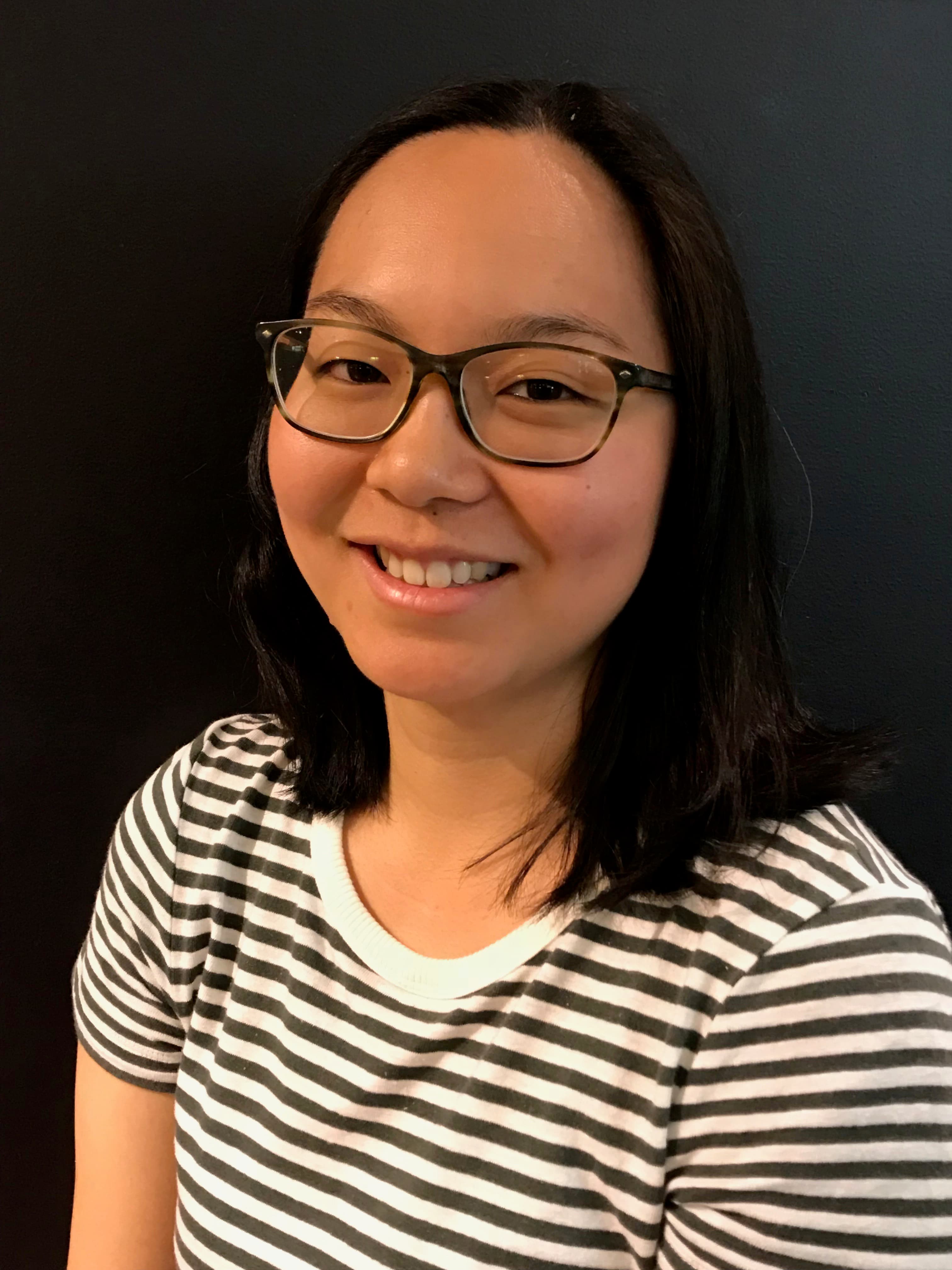 portrait of womam against a black backdrop