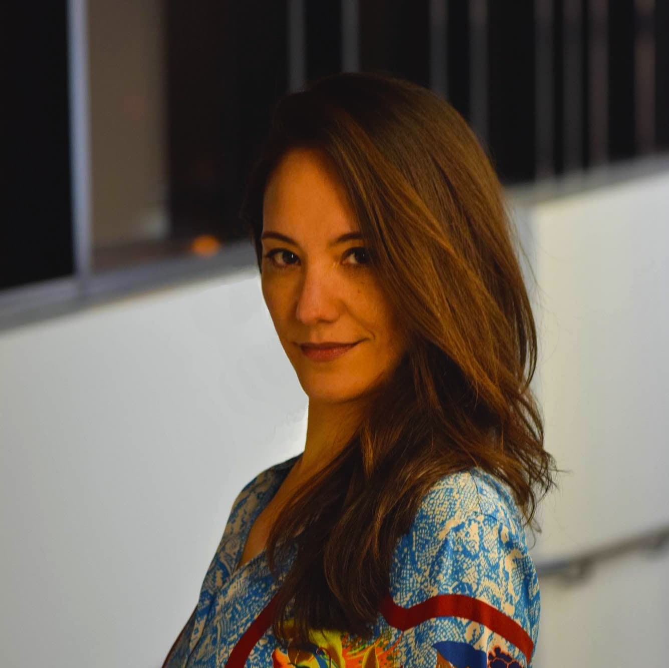 Portrait of woman looking at camera