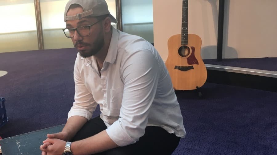 Omar Alfrouh takes a quick break during final dress rehearsal.