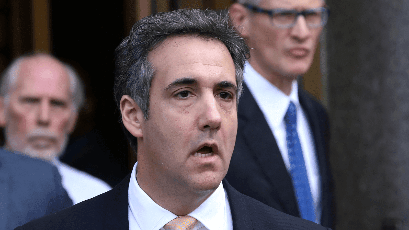 Michael Cohen outside of court, looking stressed out