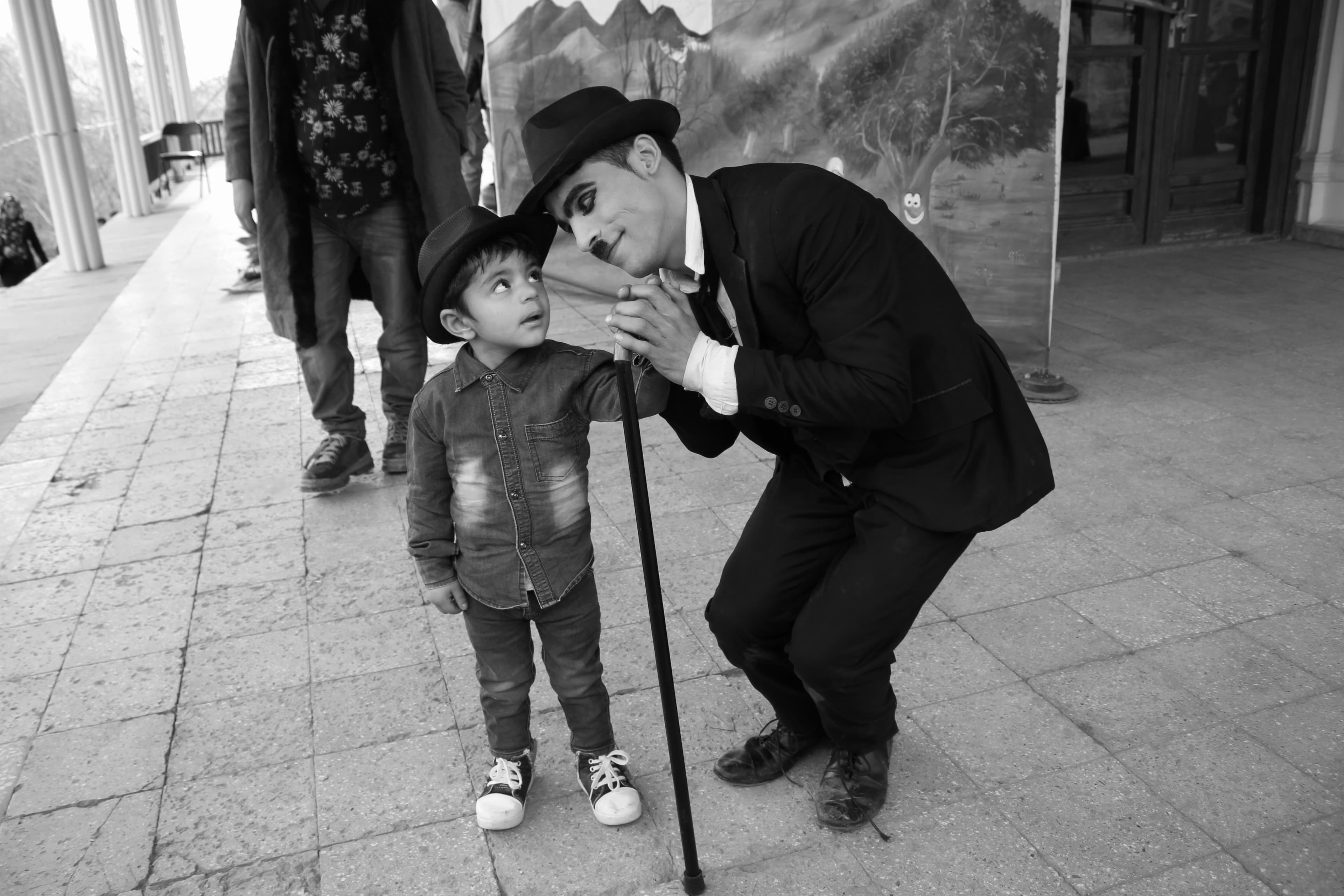 Karim Asir greets an audience member.