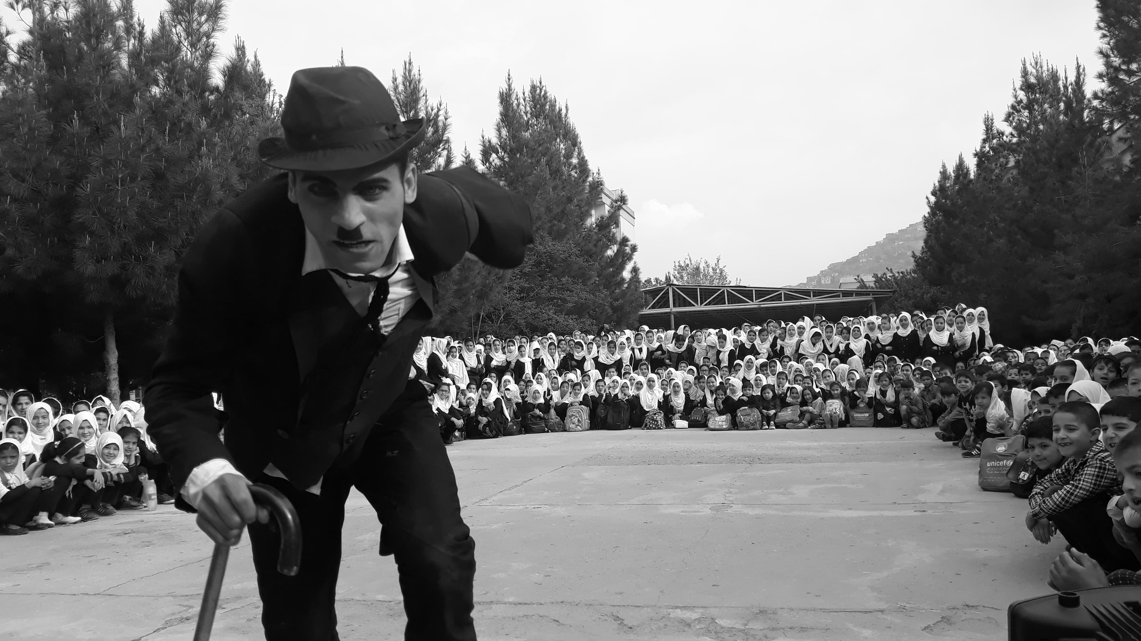 Karim Asir performs for school kids in Kabul, Afghanistan.