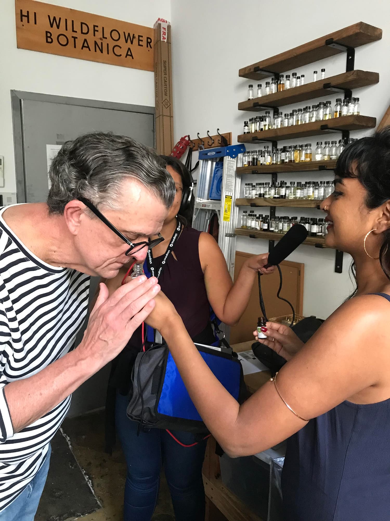 Kurt Andersen smells a scent offered by Tanwi Nandini Islam.