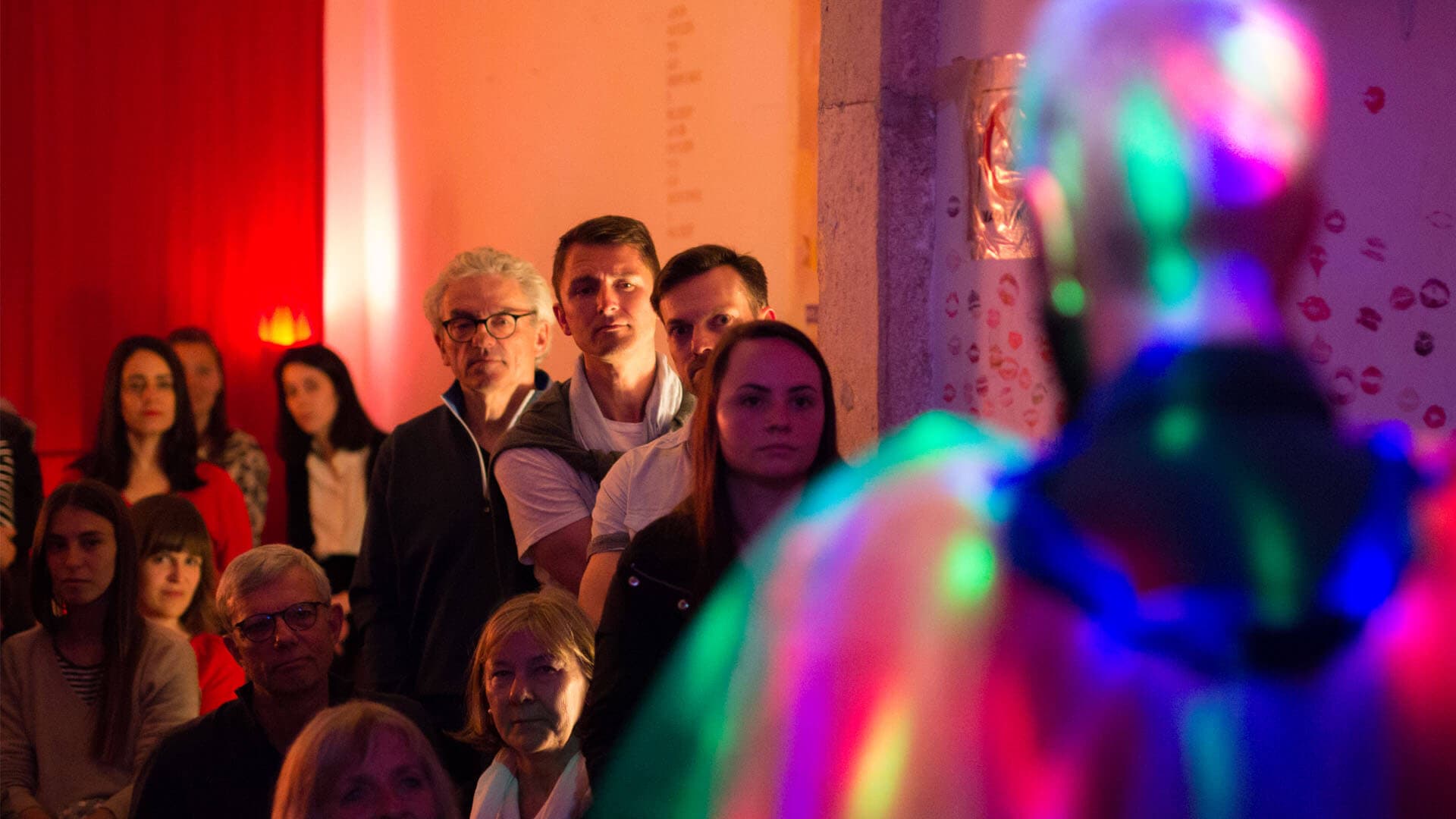 a view over Lila's shoulder, looking at the crowd