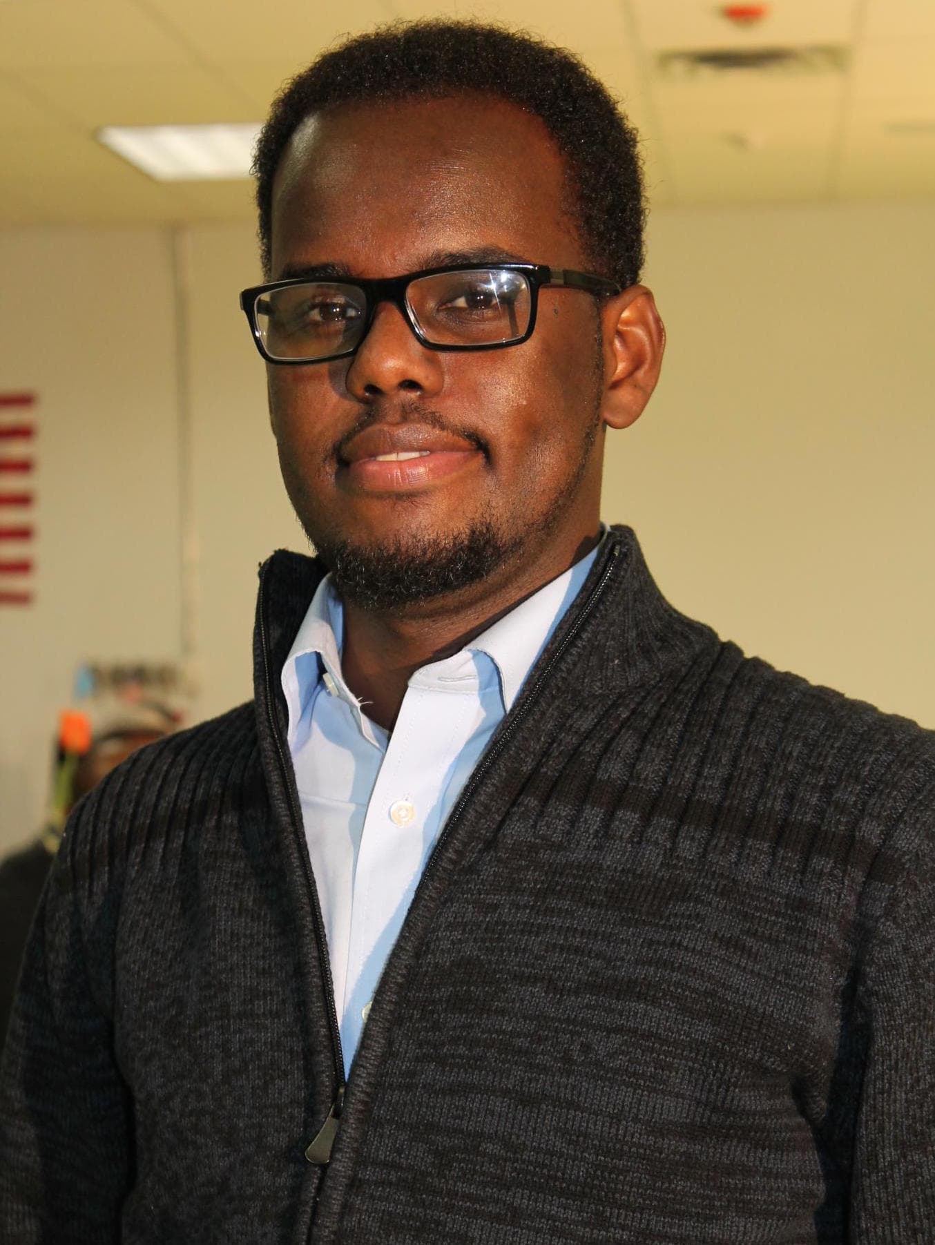 A headshot of a young man