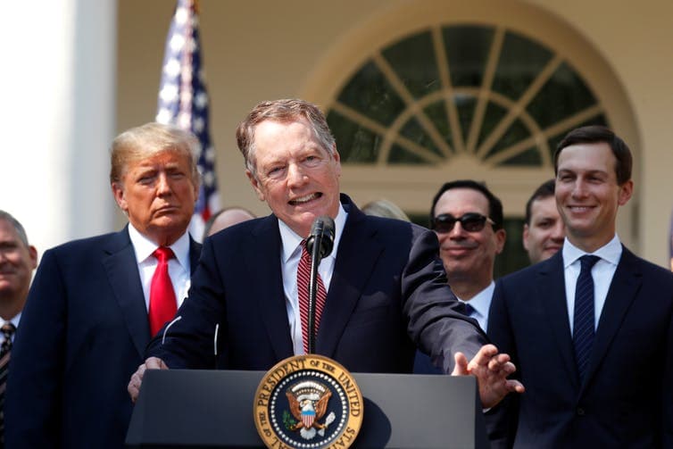 Trump and US Trade Representative Robert Lighthizer standing in front of the white house