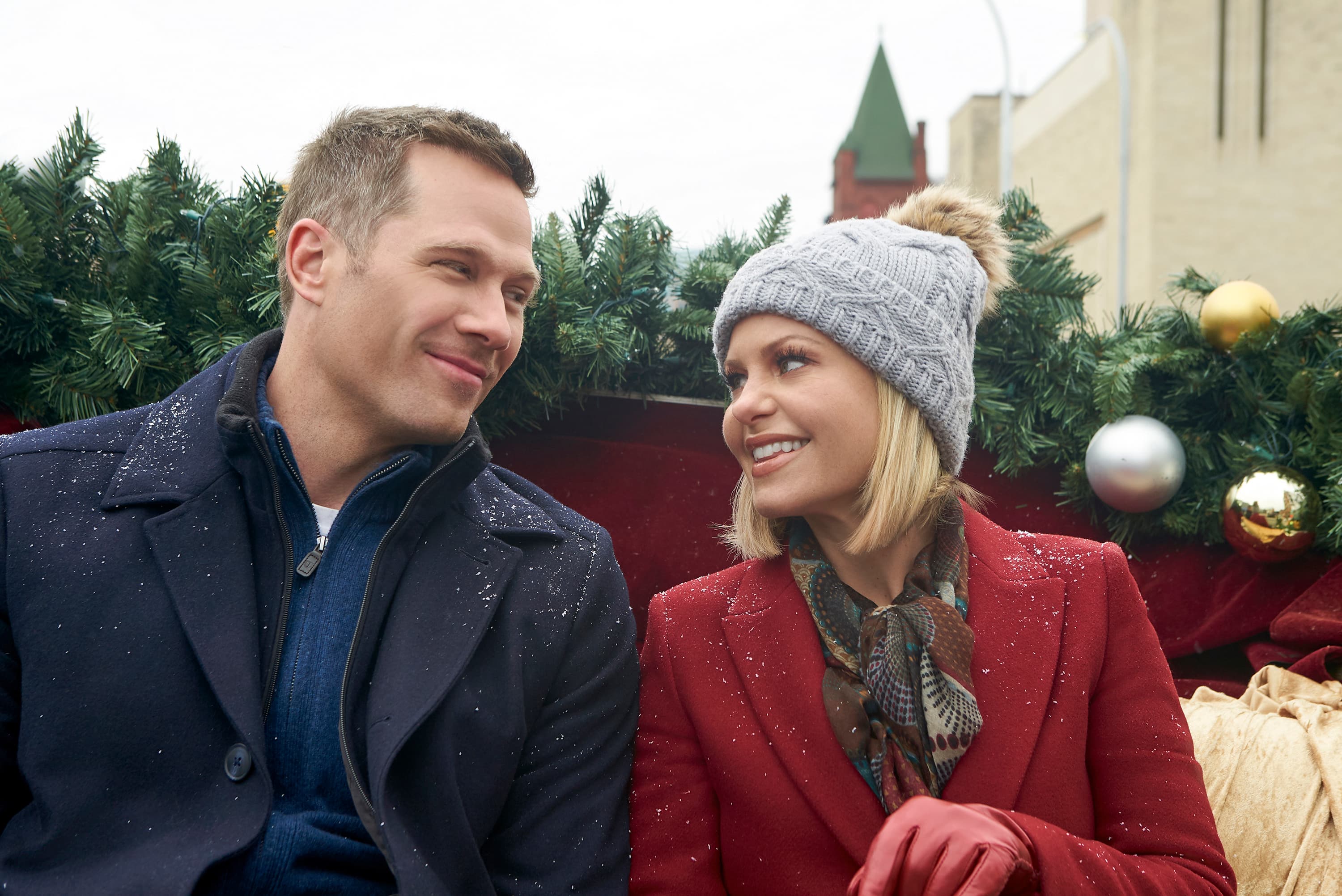 Luke Macfarlane and Candace Cameron Bure in “A Shoe Addict’s Christmas.”