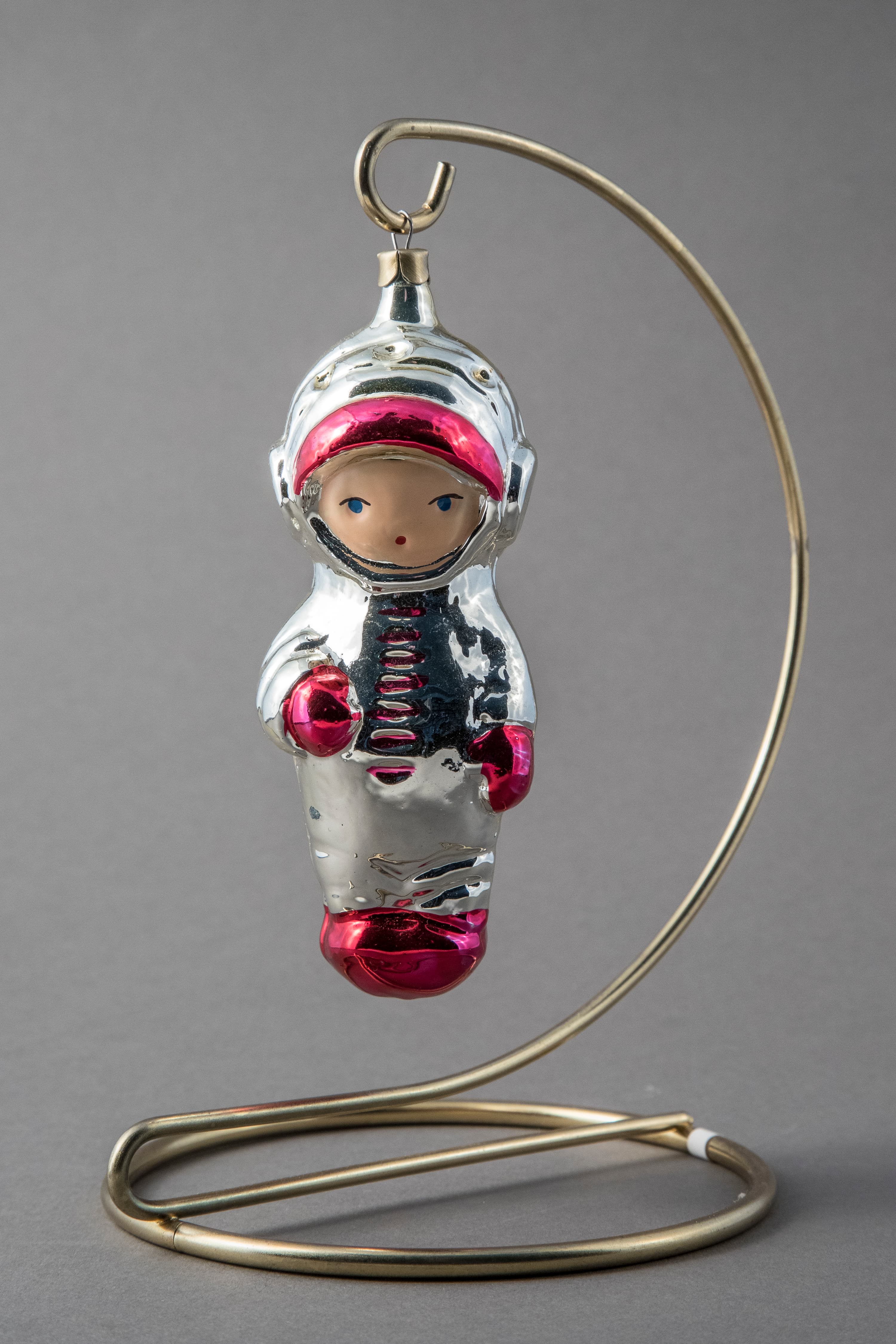 A cosmonaut ornament from 1960, made of painted blown glass in a Russian factory.