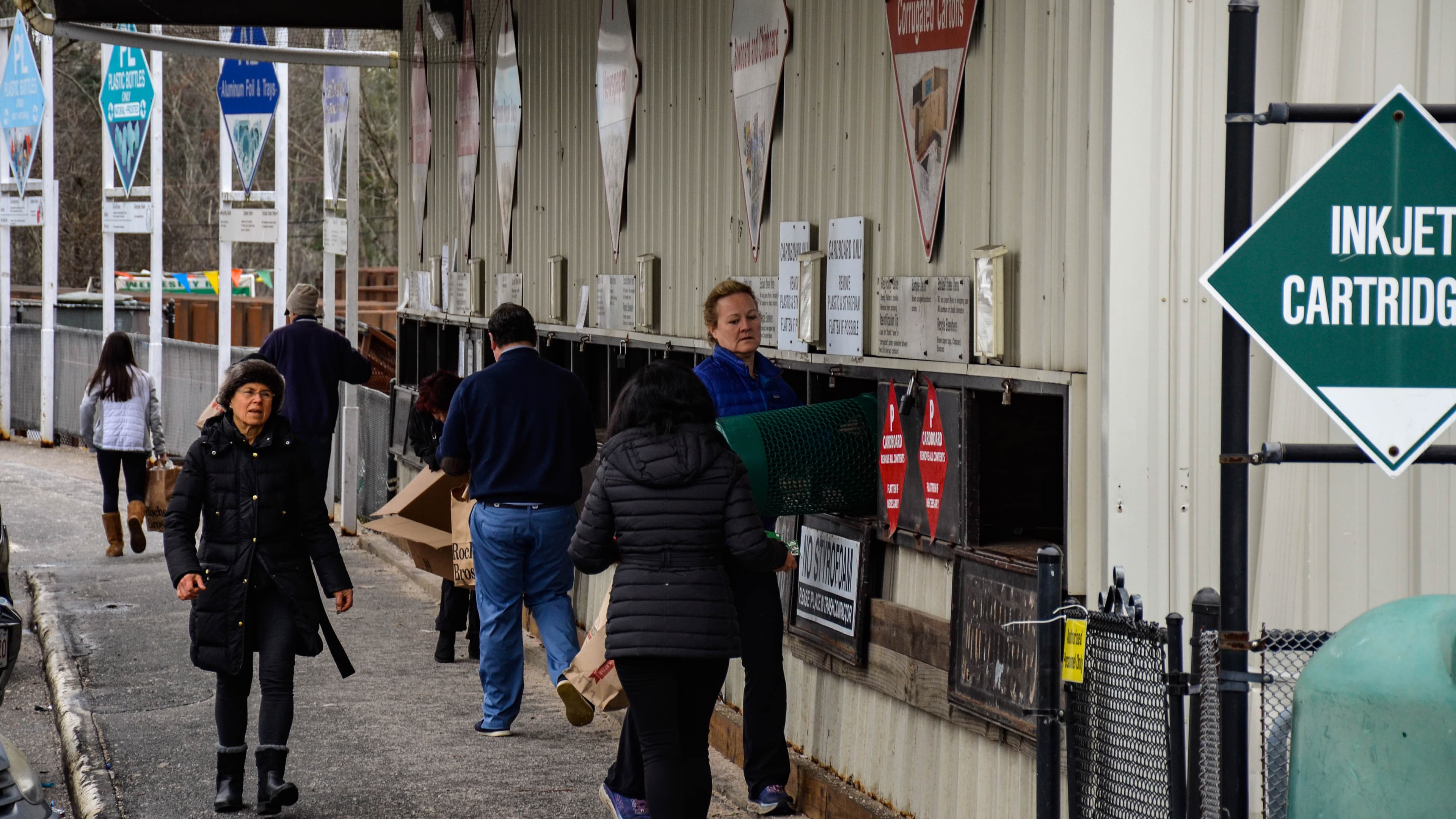 At the Wellesley recycling center, just west of Boston, residents drop their recyclables into 43 different sorting stations.