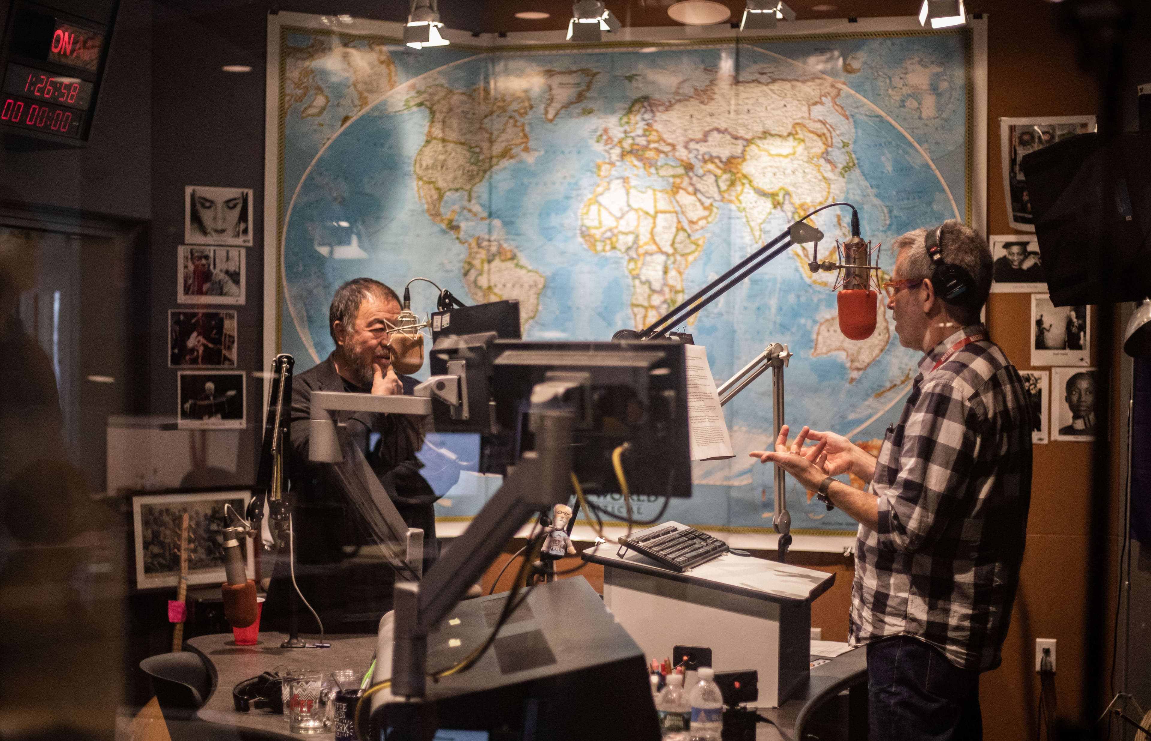 Marco Werman in the studio on the right-hand side facing Ai Weiwei