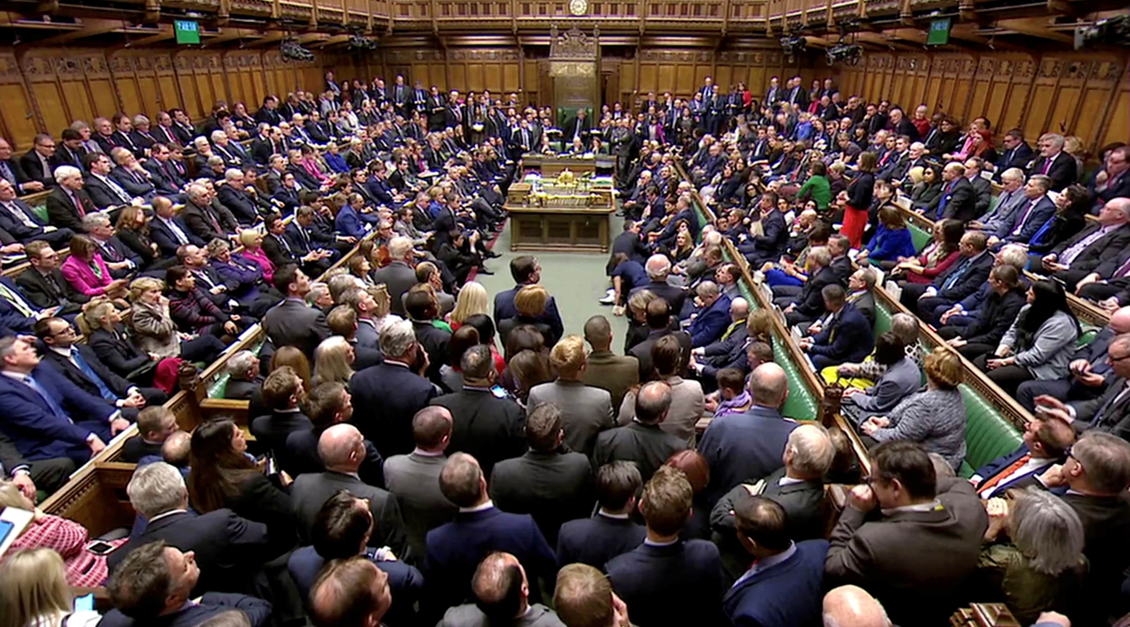 several hundred members of parliament in a room