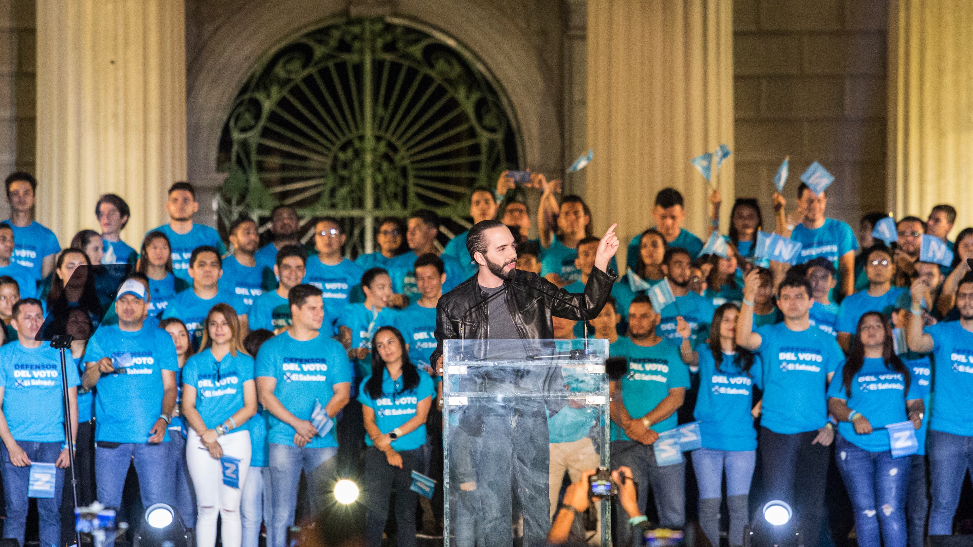 Nayib Bukele speaks at a podium.