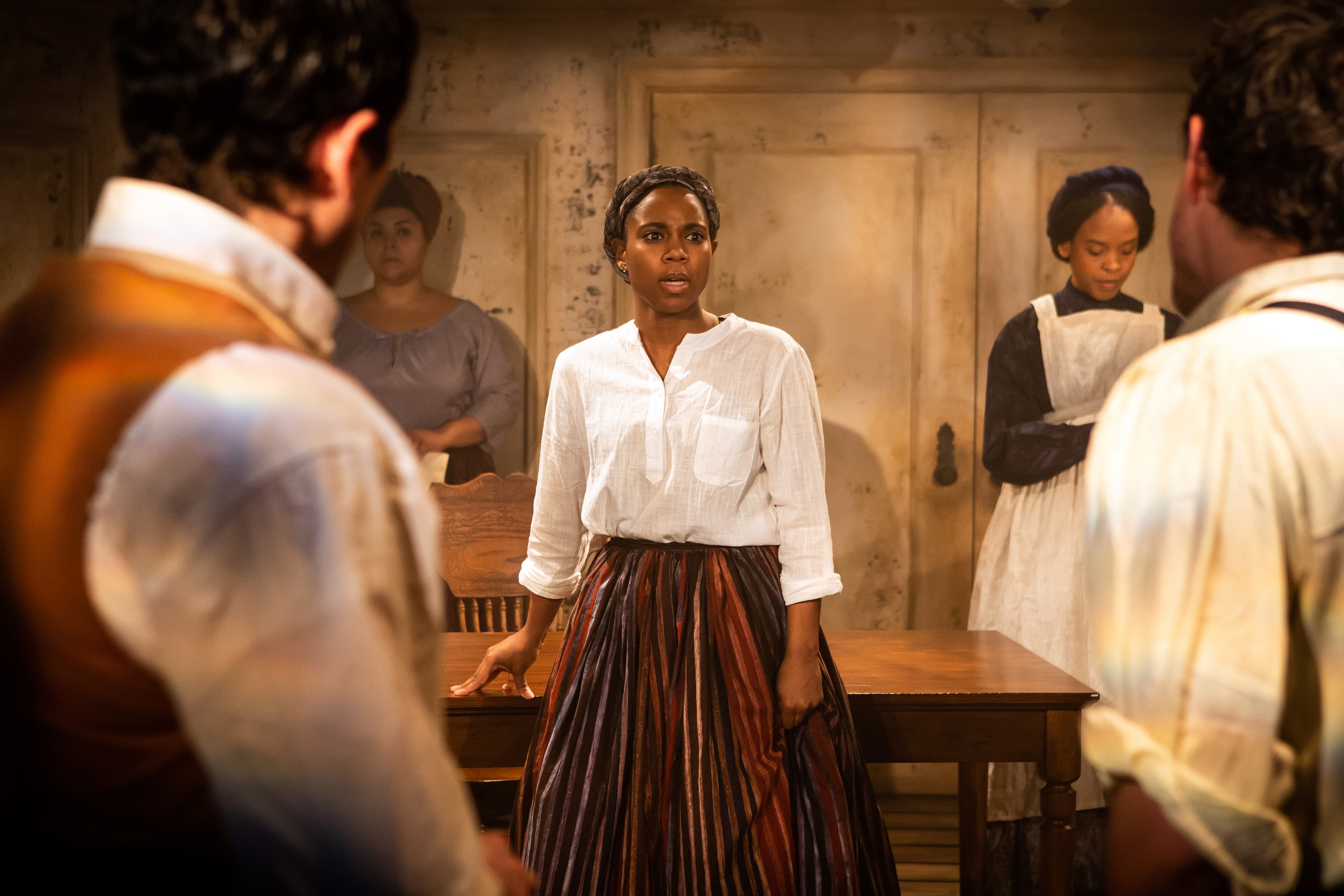 Cristina Pitter, Naomi Lorrain and Nia Calloway in “Behind the Sheet.”