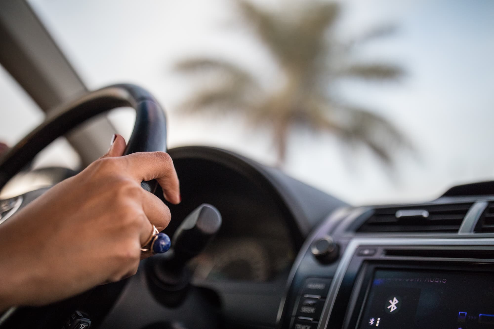 Sharia Walker has her hands on the steering wheel. She was euphoric when the ban was lifted. 