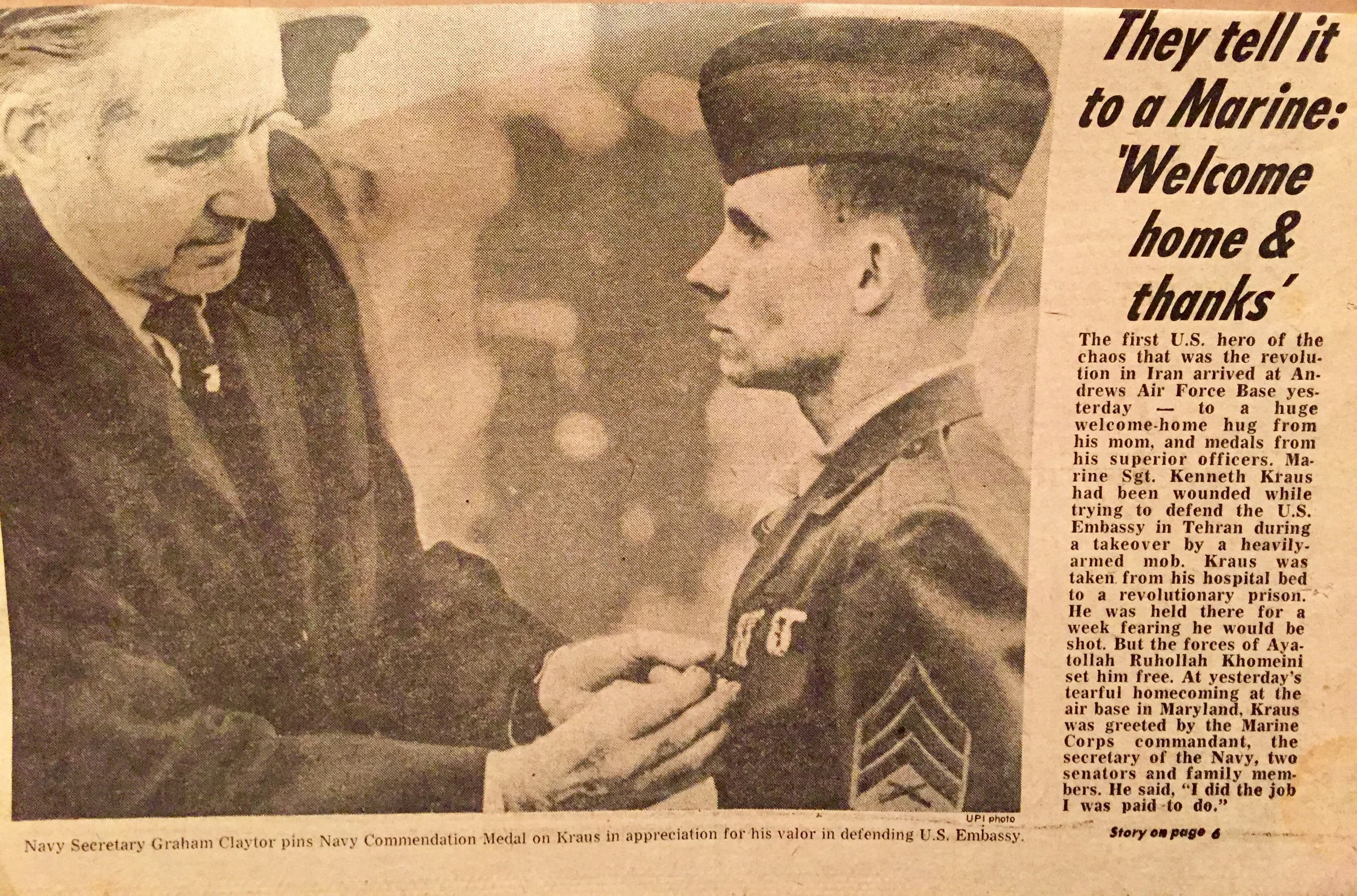 Ken Kraus receives a medal