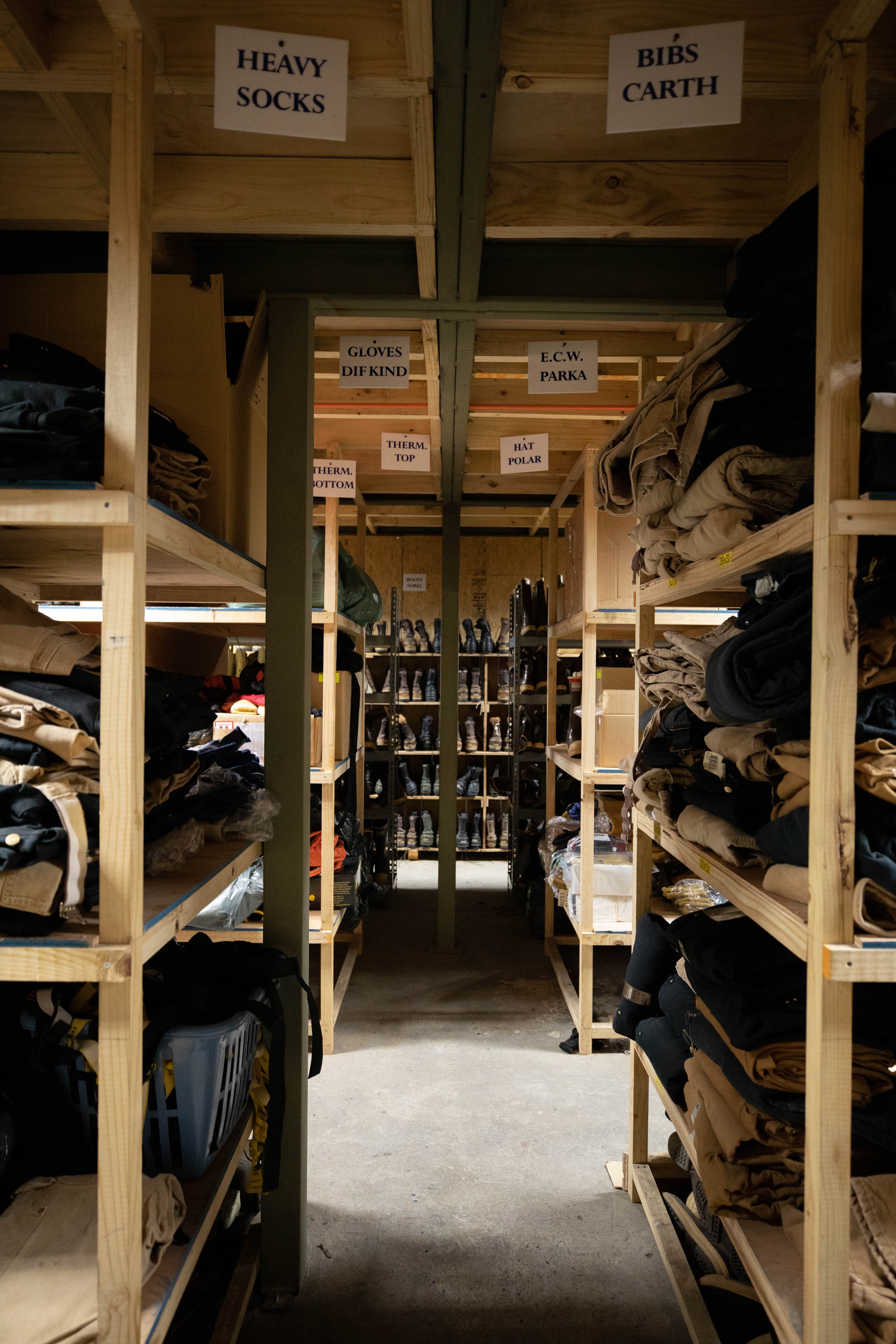 Before boarding the Palmer, passengers and crew visit the gear warehouse to get outfitted for the extreme weather that awaits them in Antarctica.