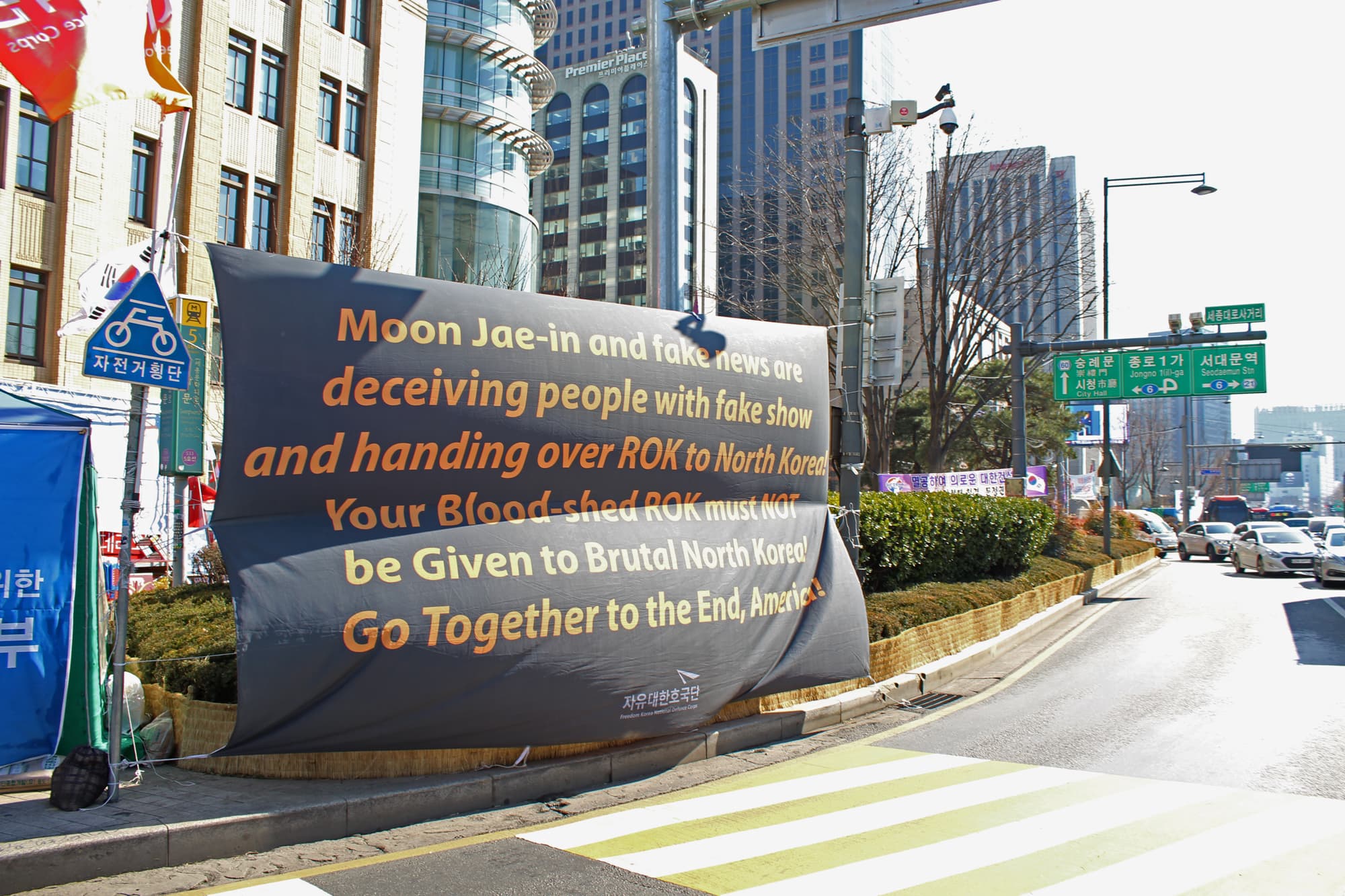 A banner in South Korea questions US-North Korea summits