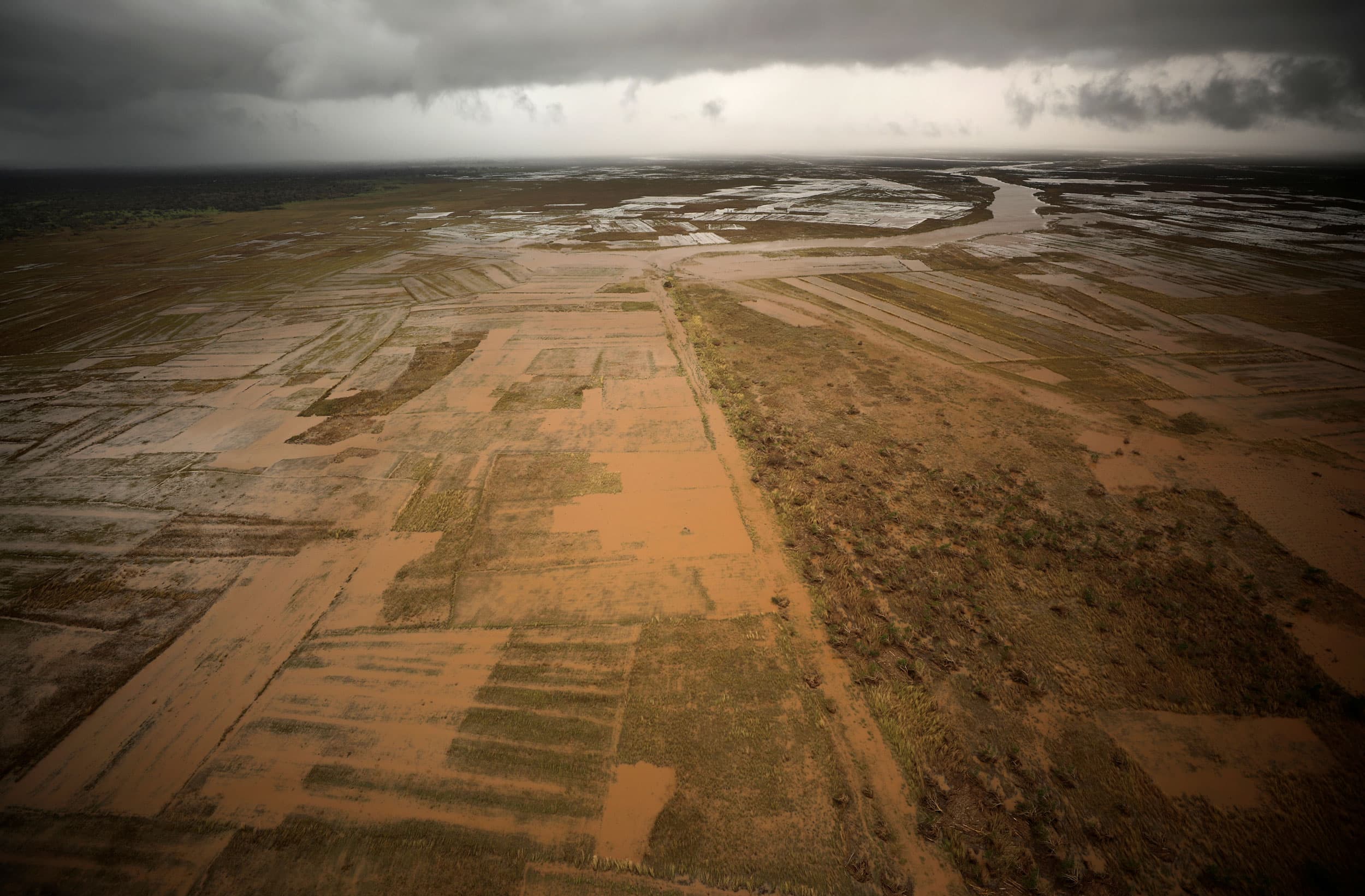 Muddy fields are seen from a birds-eye view