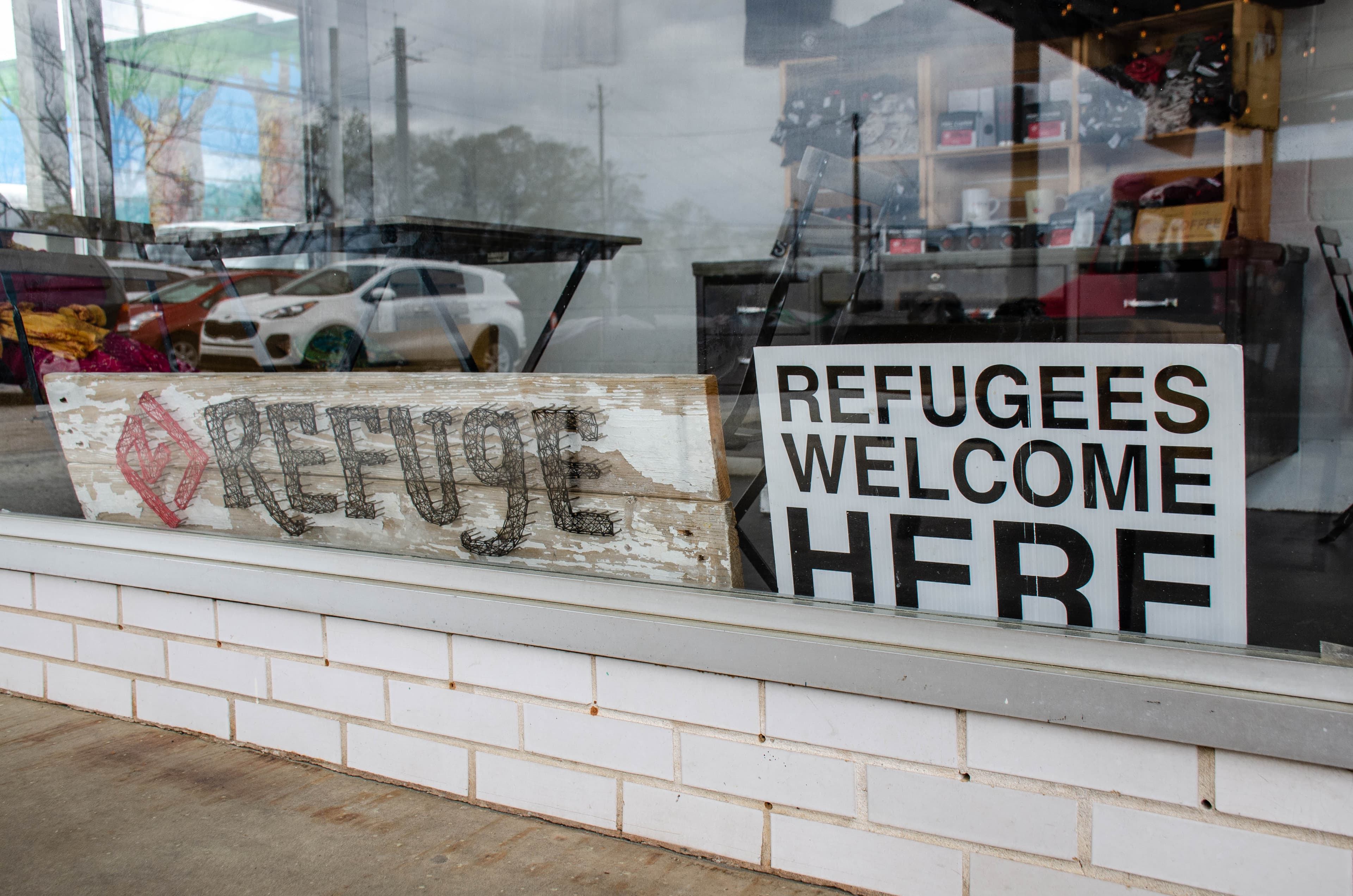 A sign welcomes Georgia’s newest arrivals at the Refuge Coffee Shop in Clarkston.