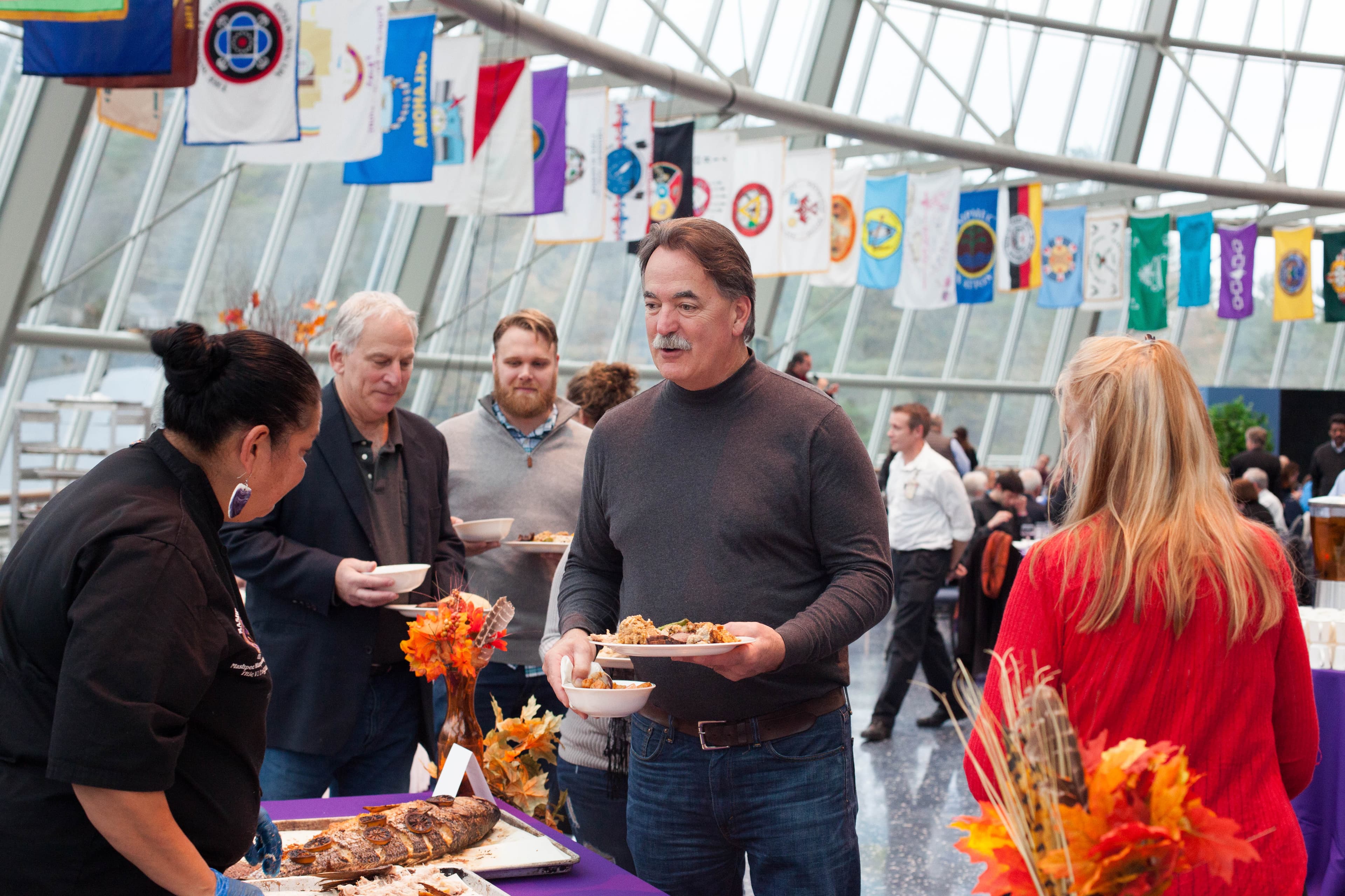 Chef Sherry Pocknett serves up striped bluefish with quahog stuffing.