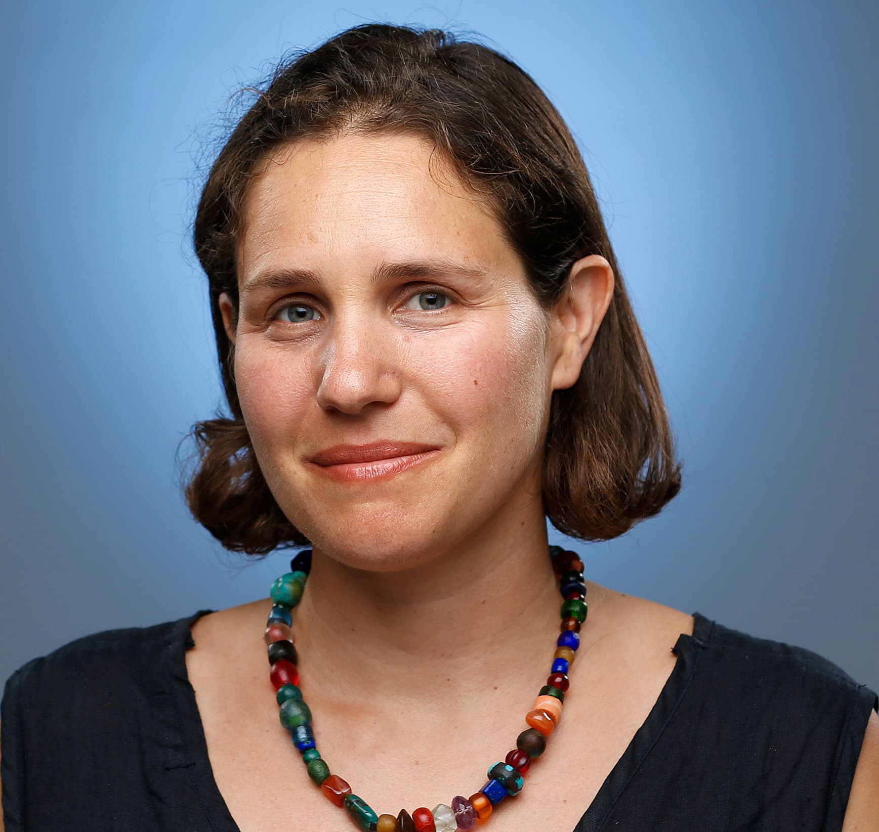 A headshot of the reporter