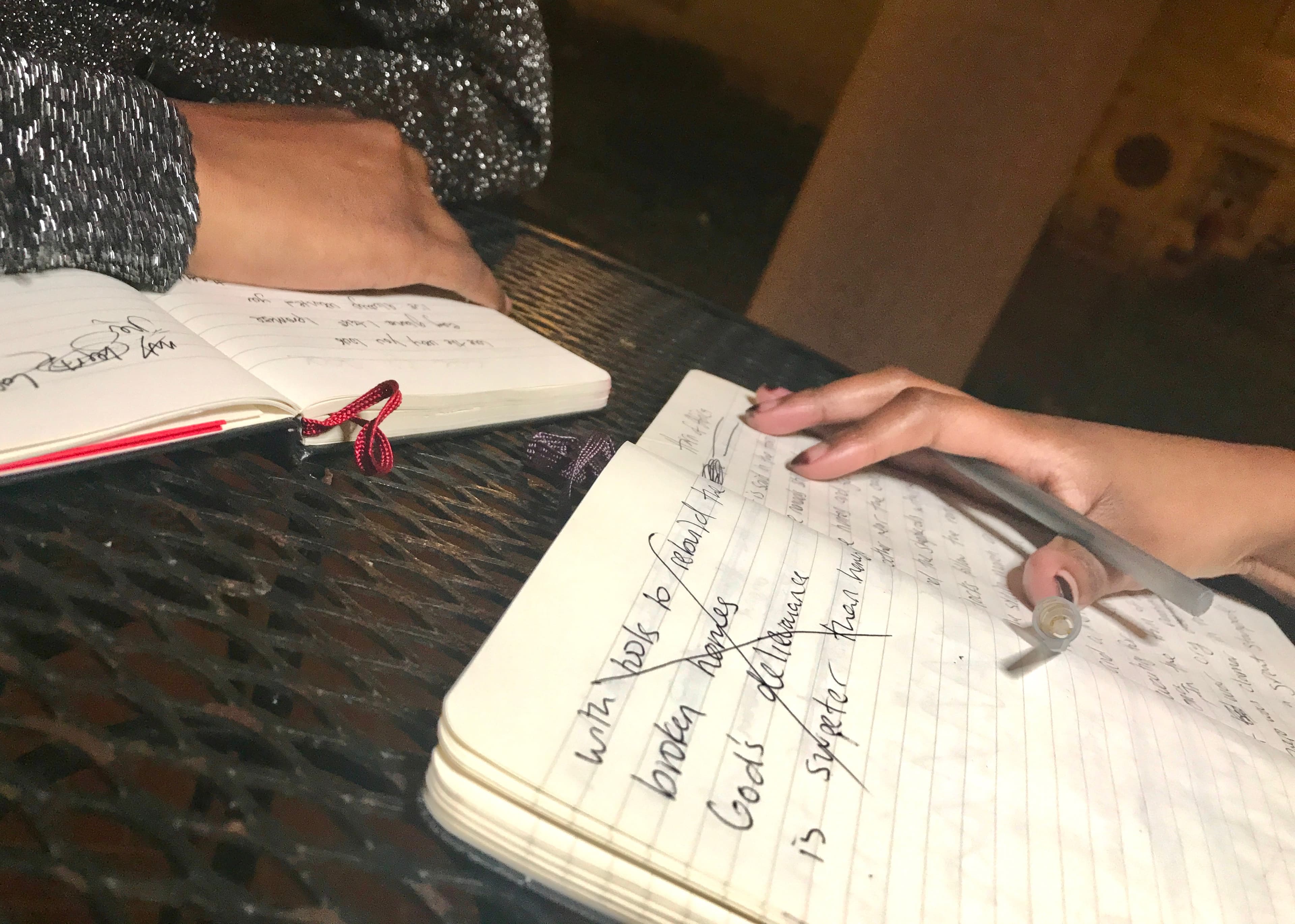 Amal Hussein and Hamdi Mohamed work on poems together.