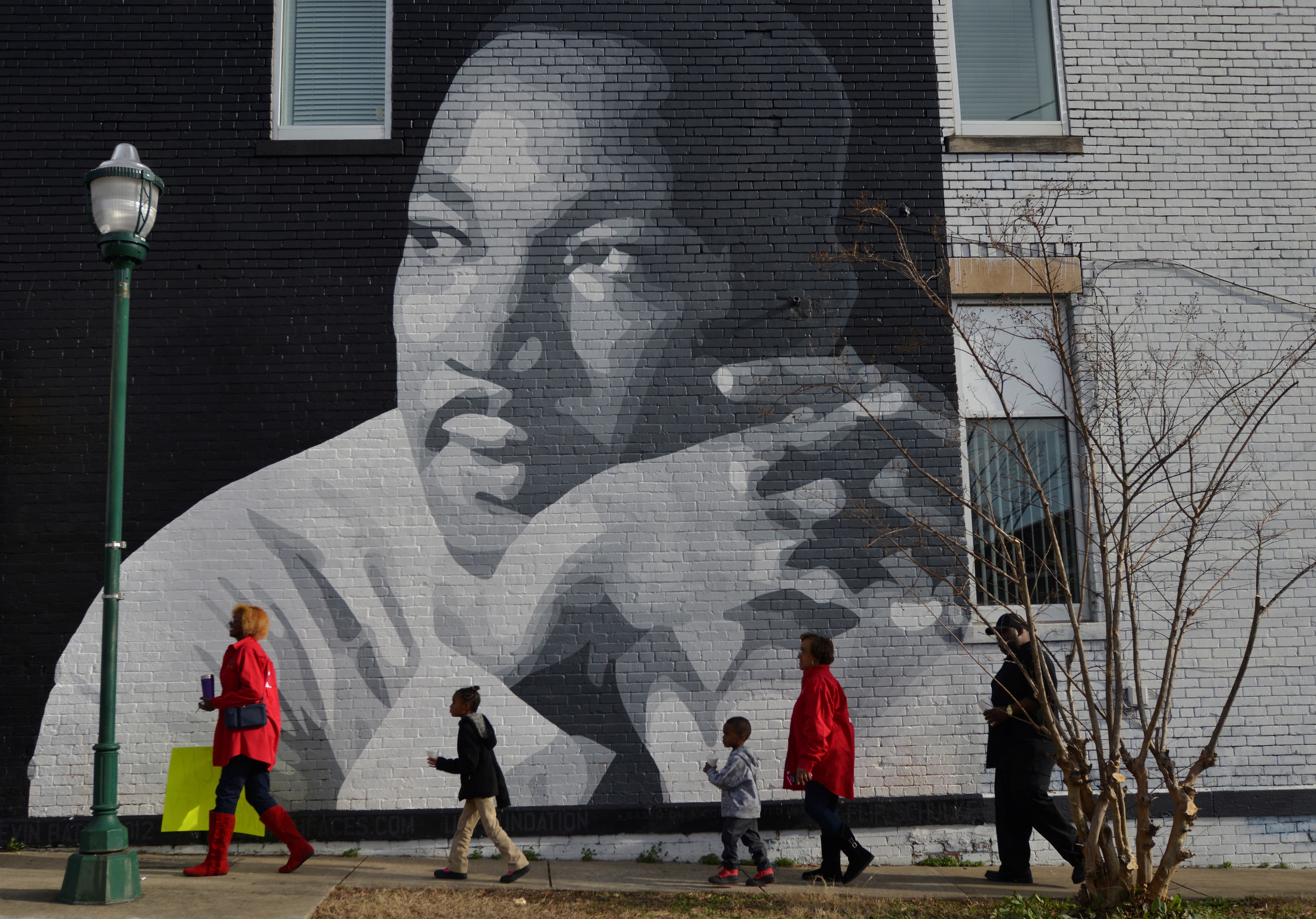 People gather to march in the annual parade down MLK Boulevard